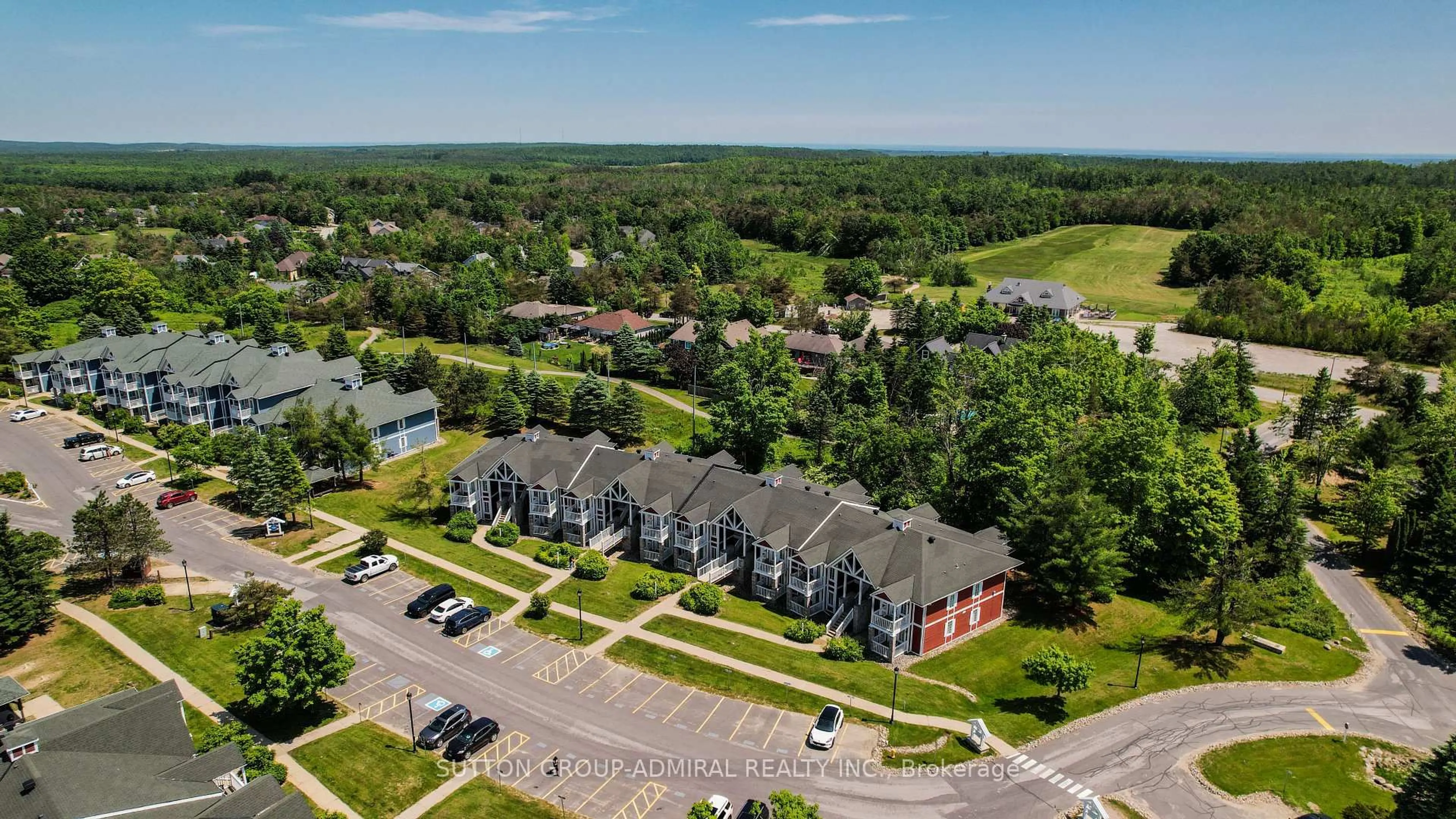 A pic from outside/outdoor area/front of a property/back of a property/a pic from drone, unknown for 90 Highland Dr #2010, Oro-Medonte Ontario L0L 2L0