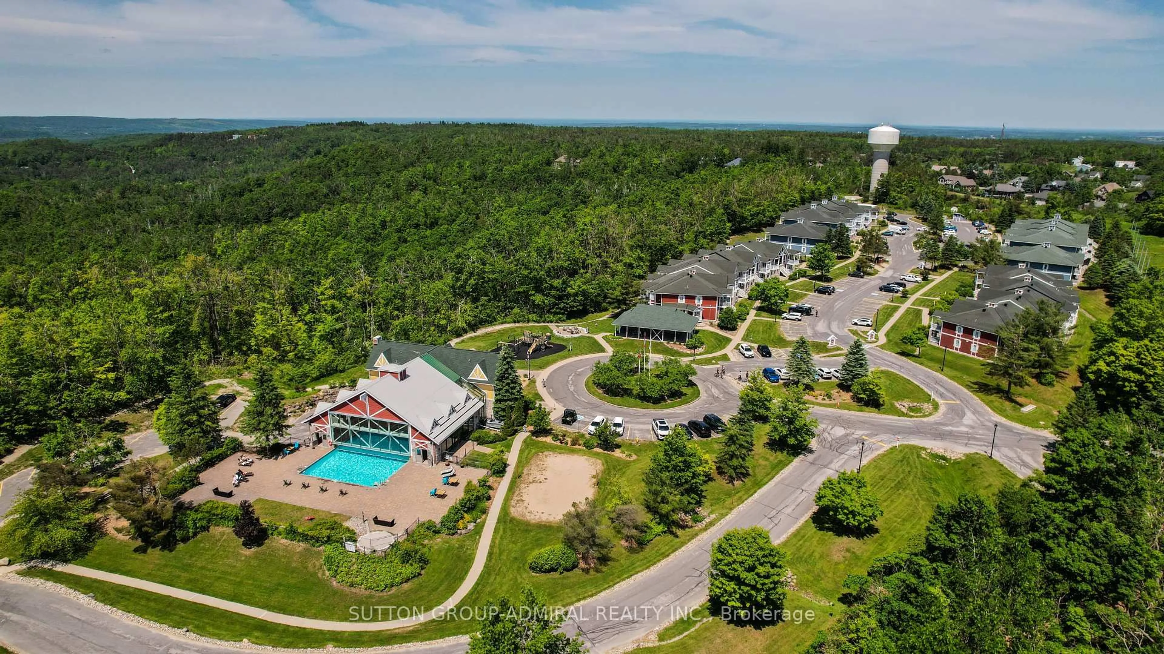 A pic from outside/outdoor area/front of a property/back of a property/a pic from drone, water/lake/river/ocean view for 90 Highland Dr #2010, Oro-Medonte Ontario L0L 2L0