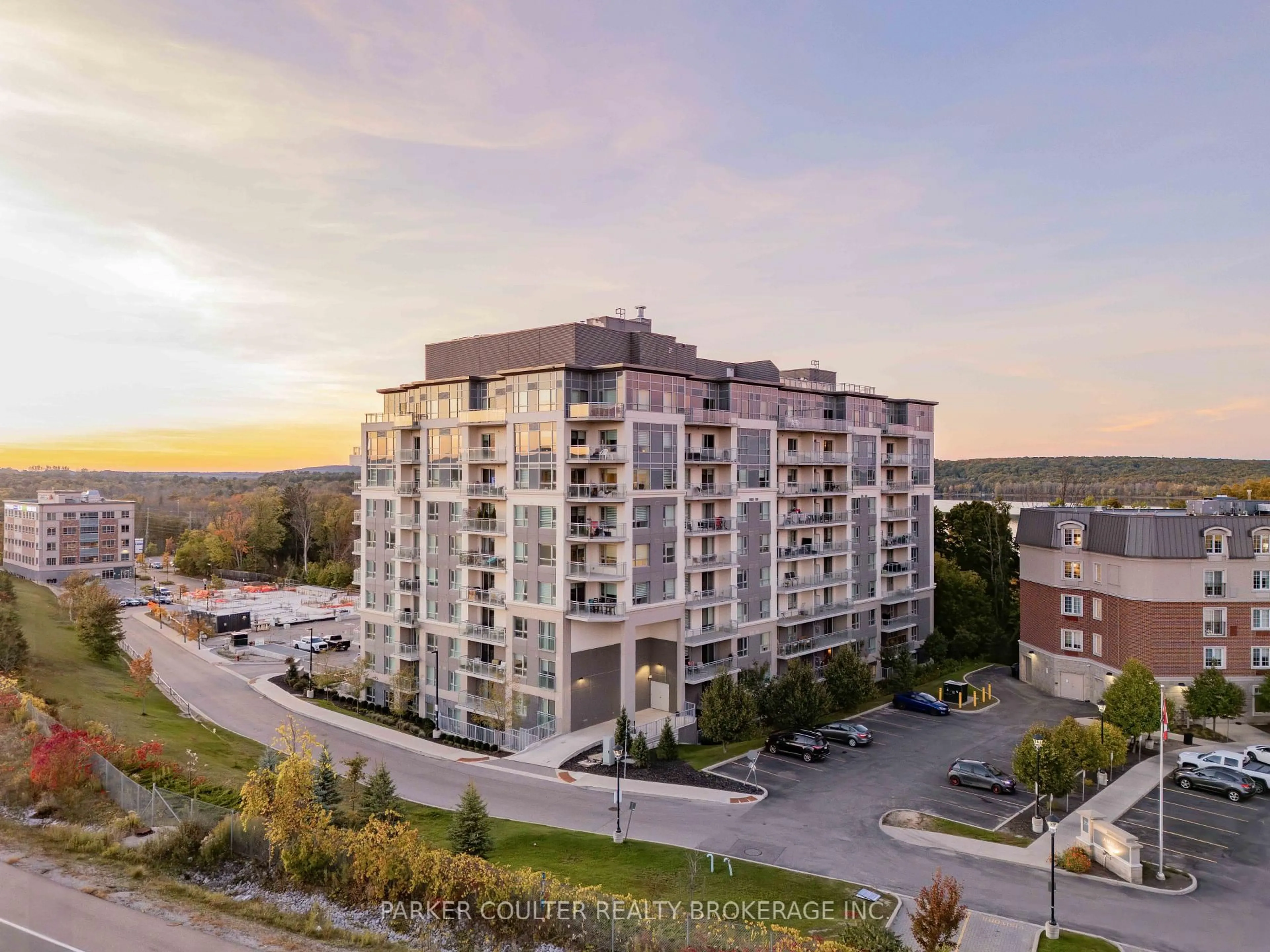A pic from outside/outdoor area/front of a property/back of a property/a pic from drone, city buildings view from balcony for 58 Lakeside Terr #207, Barrie Ontario L4M 0L5