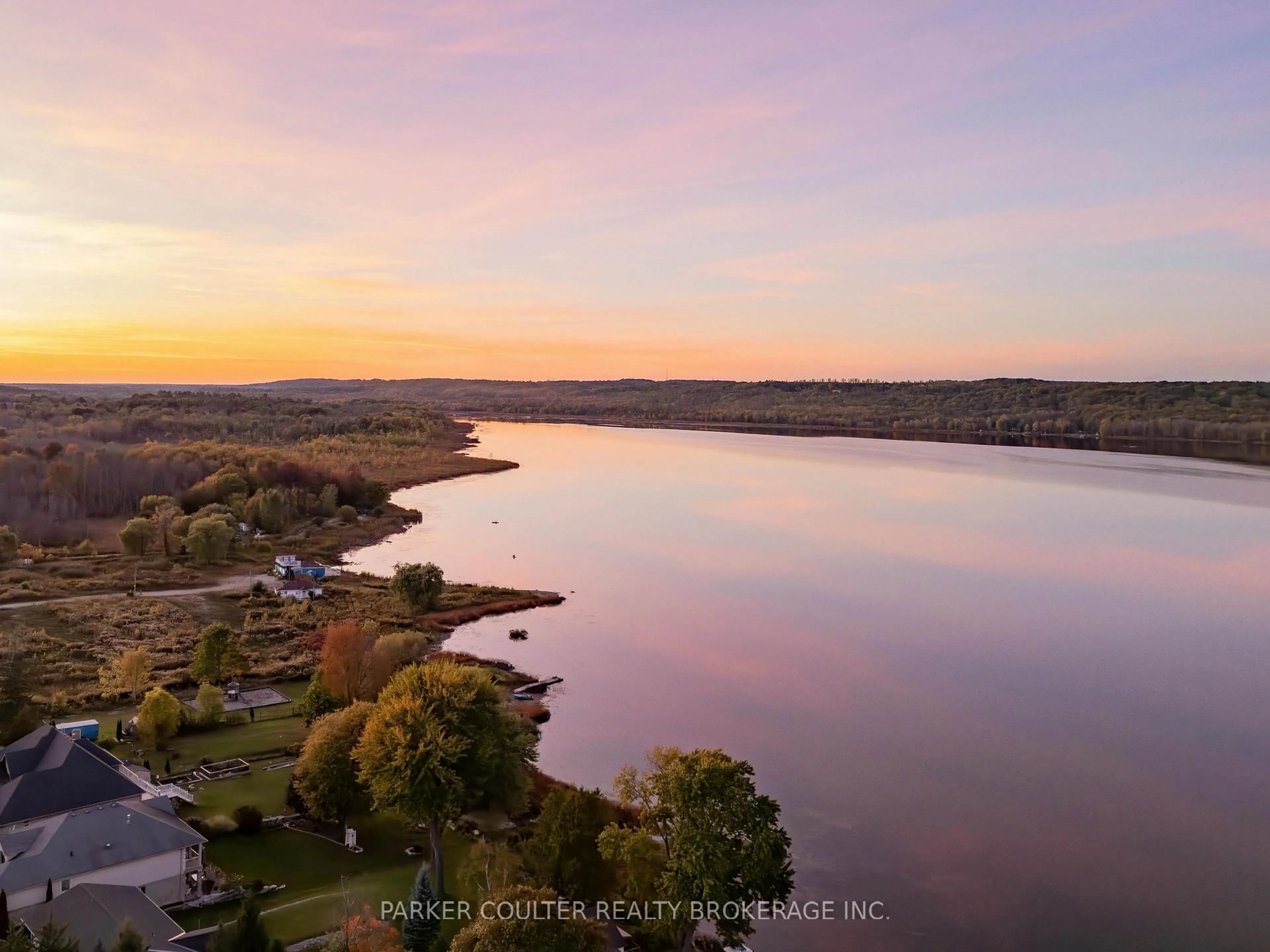 A pic from outside/outdoor area/front of a property/back of a property/a pic from drone, water/lake/river/ocean view for 58 Lakeside Terr #207, Barrie Ontario L4M 0L5