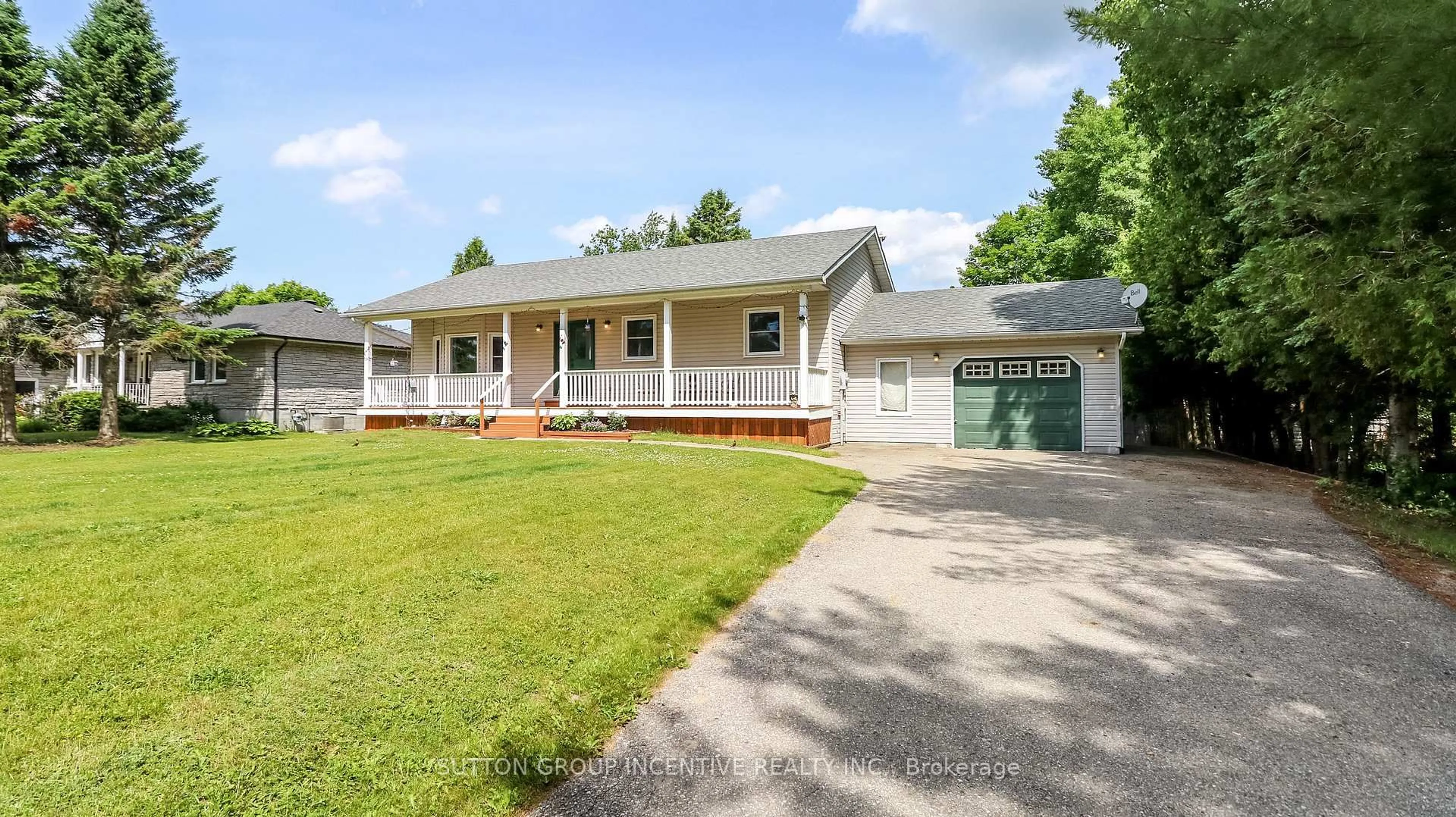 Home with vinyl exterior material, street for 54 Mill St, Springwater Ontario L0L 1V0