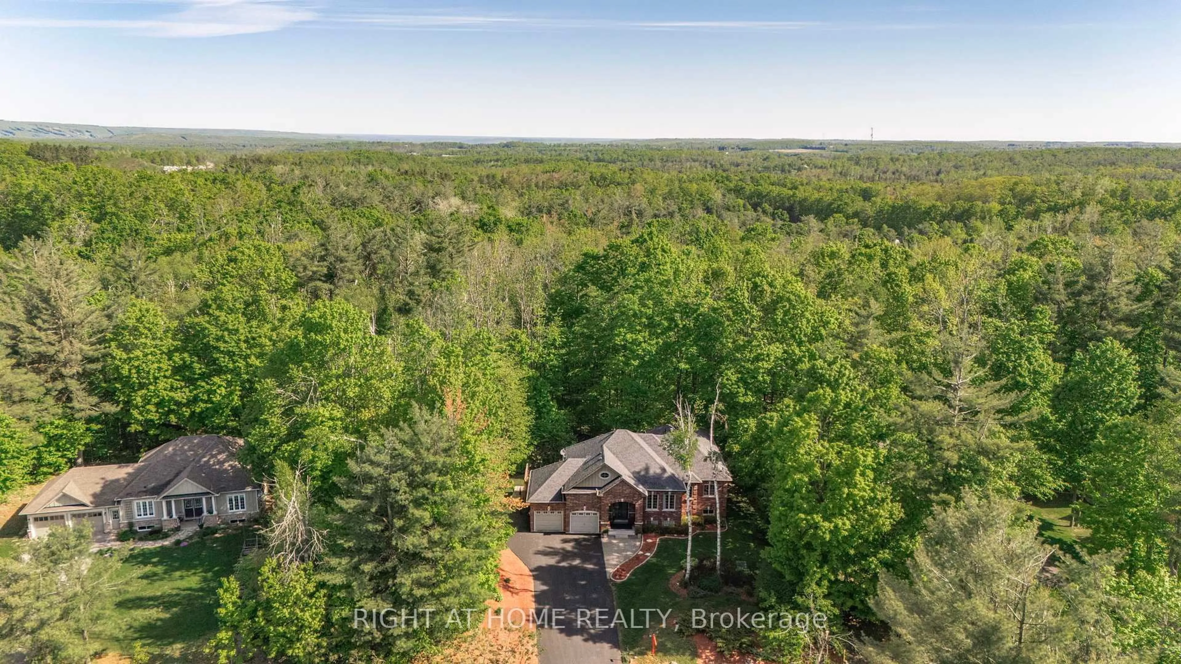 A pic from outside/outdoor area/front of a property/back of a property/a pic from drone, forest/trees view for 20 Diamond Valley Dr, Oro-Medonte Ontario L0L 2E0