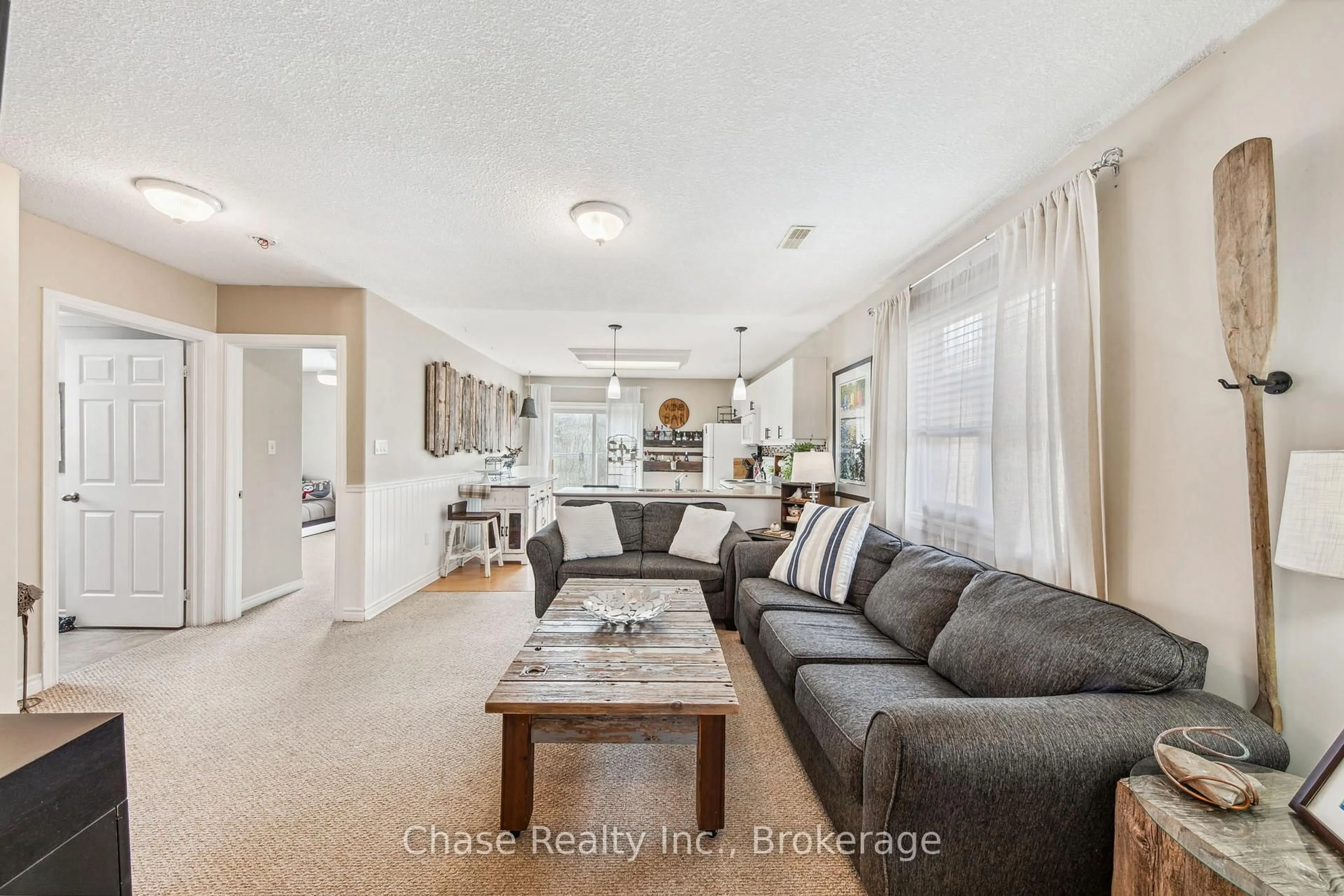 Living room with furniture, unknown for 239 Yonge St, Midland Ontario L4R 2B1