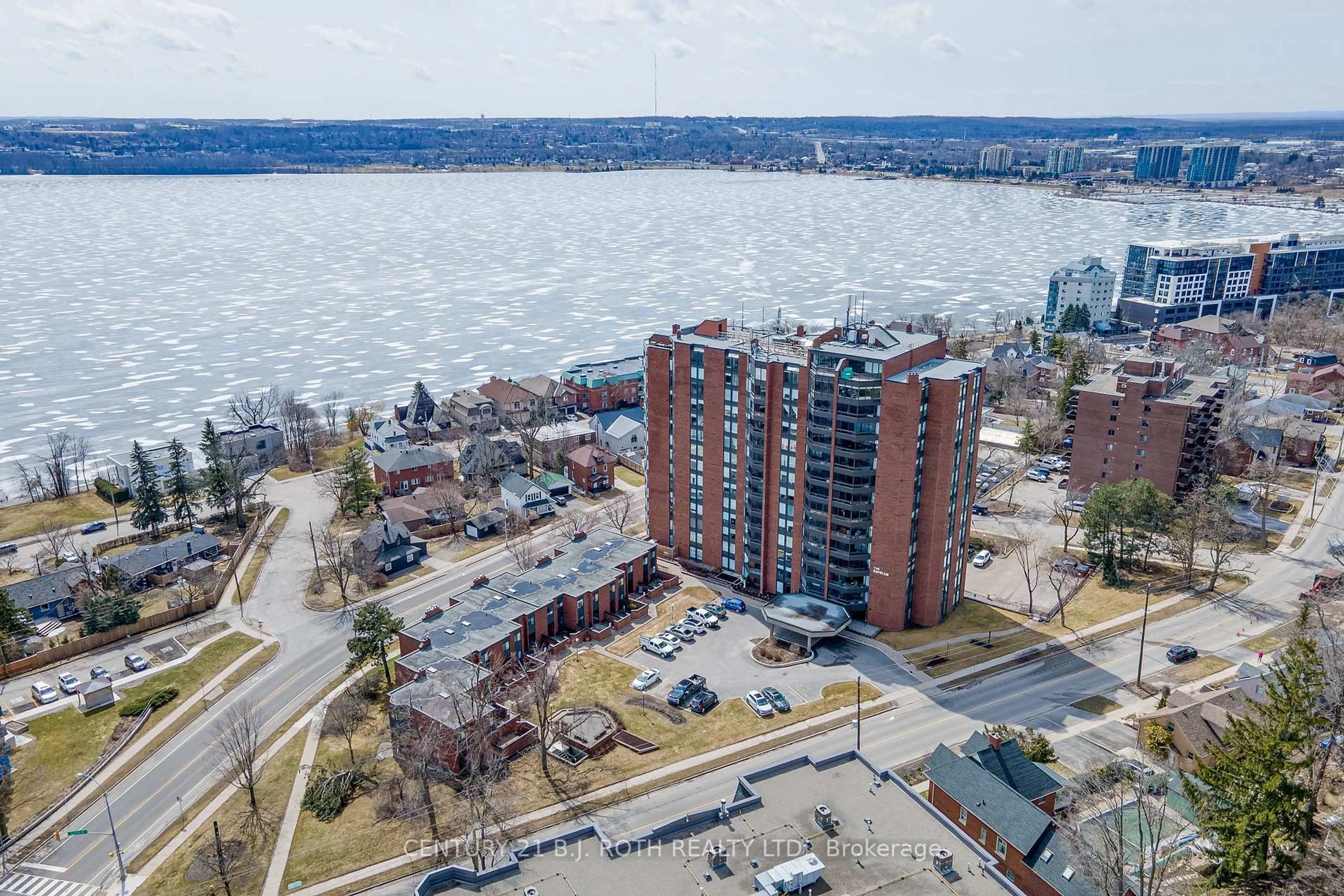 A pic from outside/outdoor area/front of a property/back of a property/a pic from drone, water/lake/river/ocean view for 181 Collier St #301, Barrie Ontario L4M 5L6
