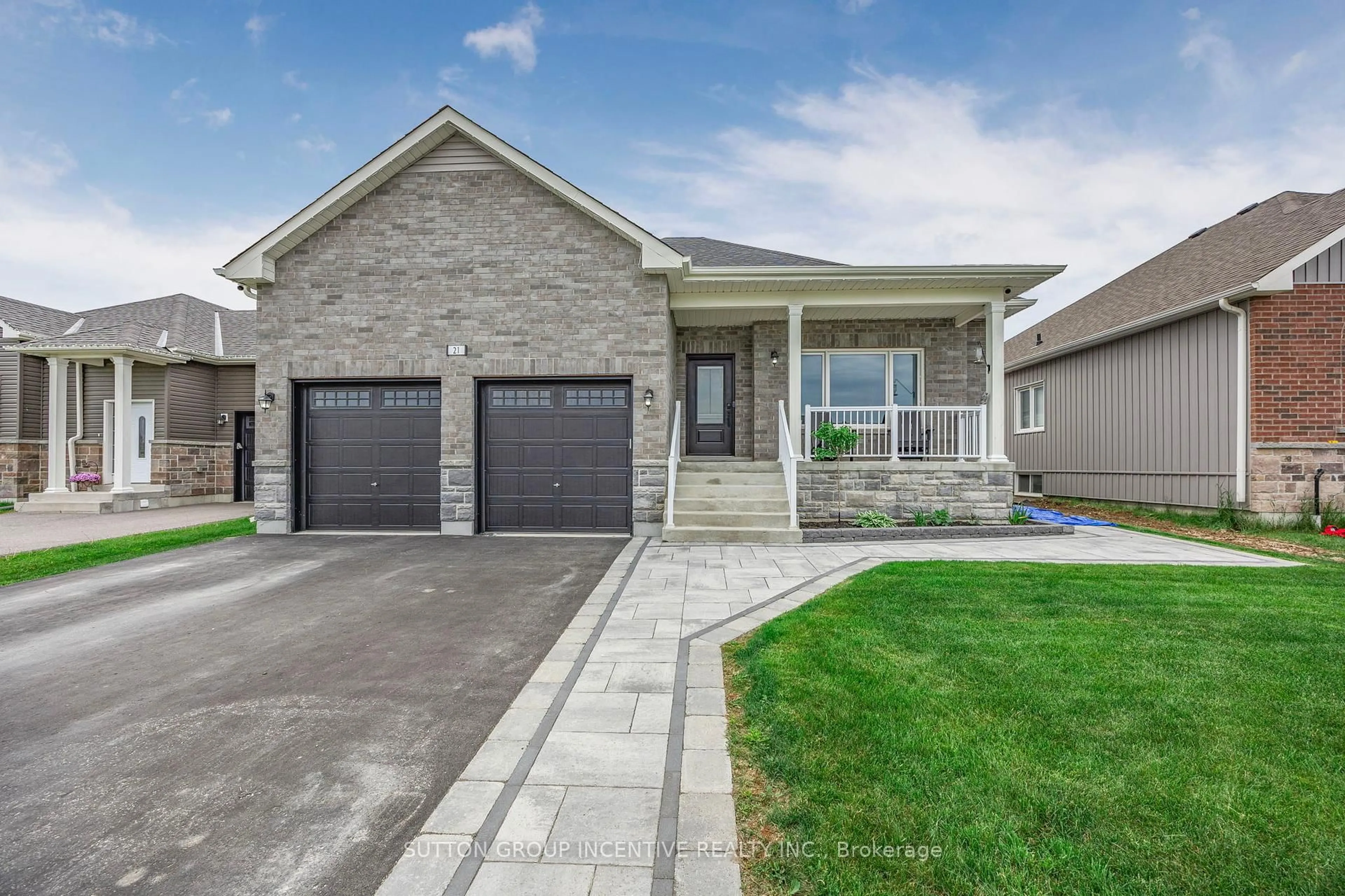 Home with brick exterior material, street for 21 Beverly St, Springwater Ontario L0L 1P0