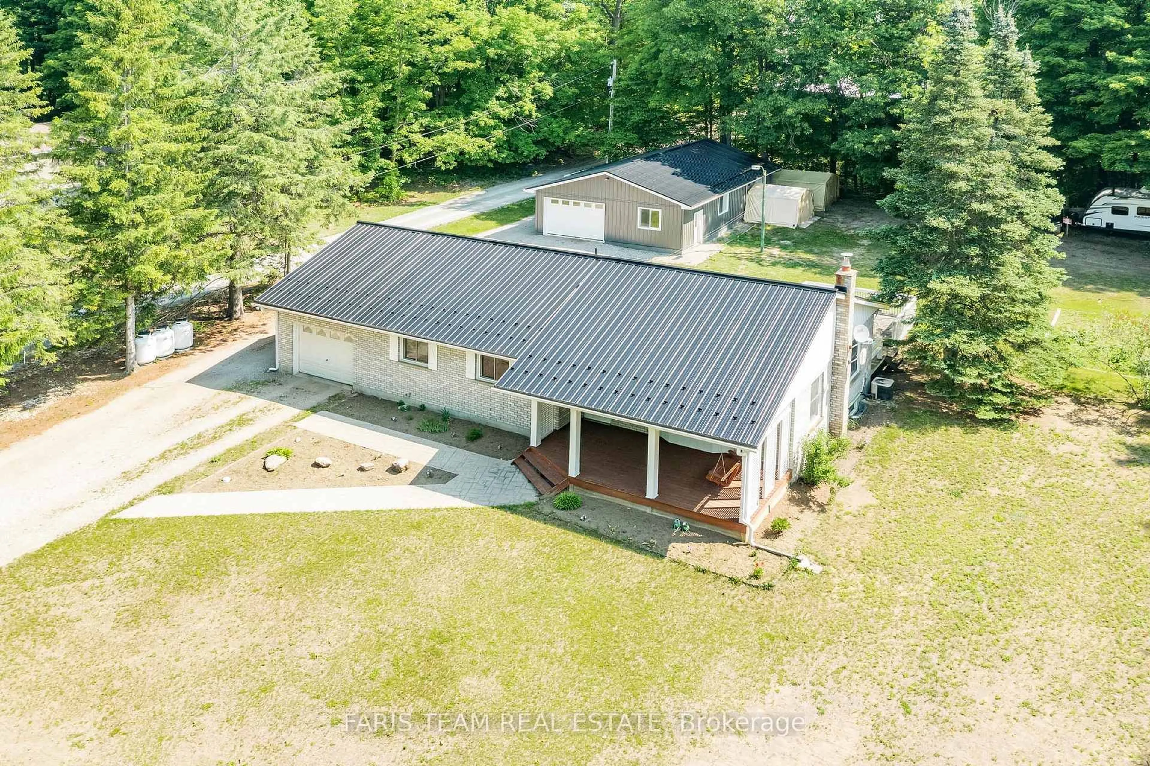 A pic from outside/outdoor area/front of a property/back of a property/a pic from drone, building for 1941 Vespra Valley Rd, Springwater Ontario L0L 1Y2