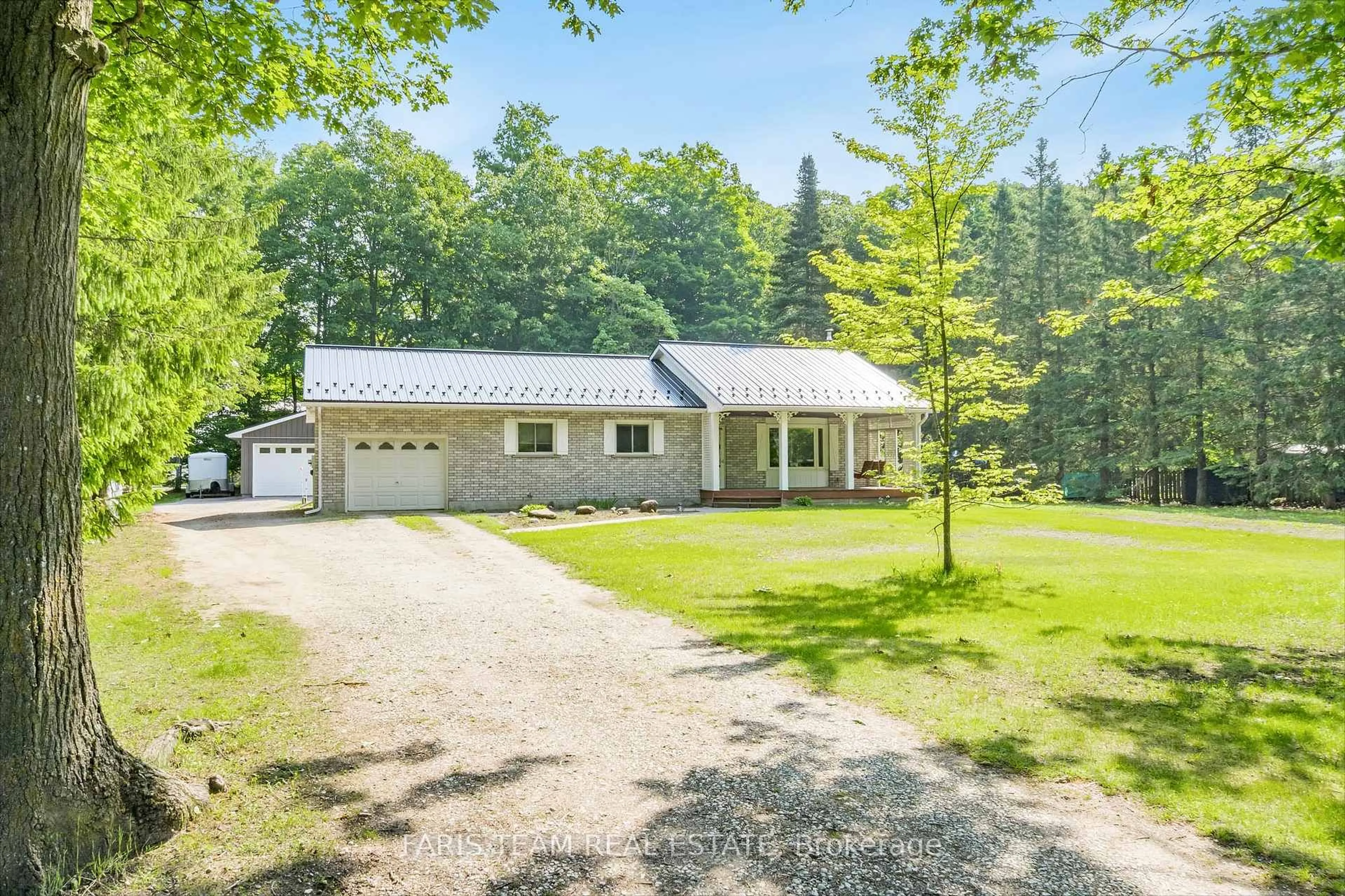 A pic from outside/outdoor area/front of a property/back of a property/a pic from drone, street for 1941 Vespra Valley Rd, Springwater Ontario L0L 1Y2