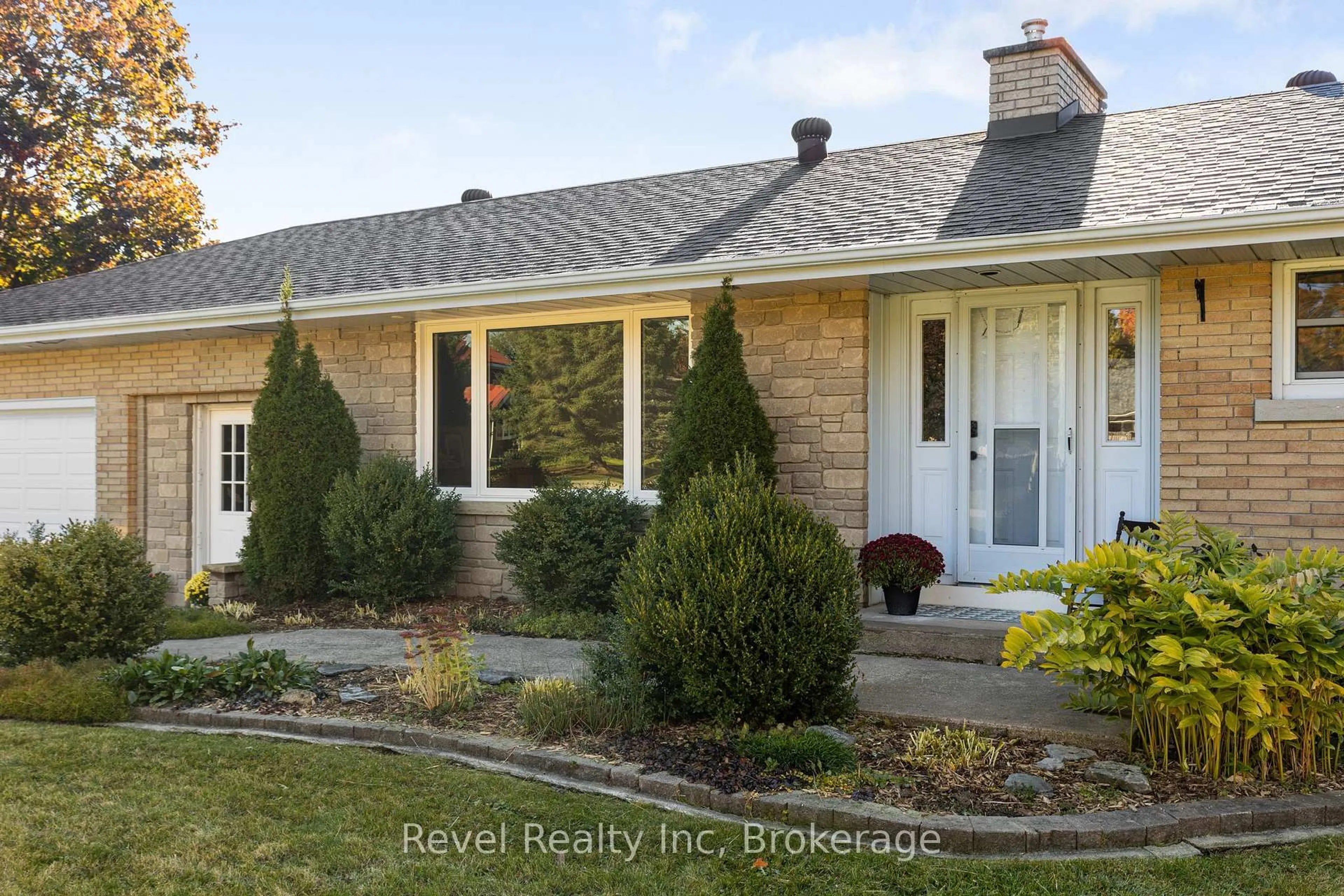 Home with vinyl exterior material, street for 21 John St, Springwater Ontario L0L 1P0