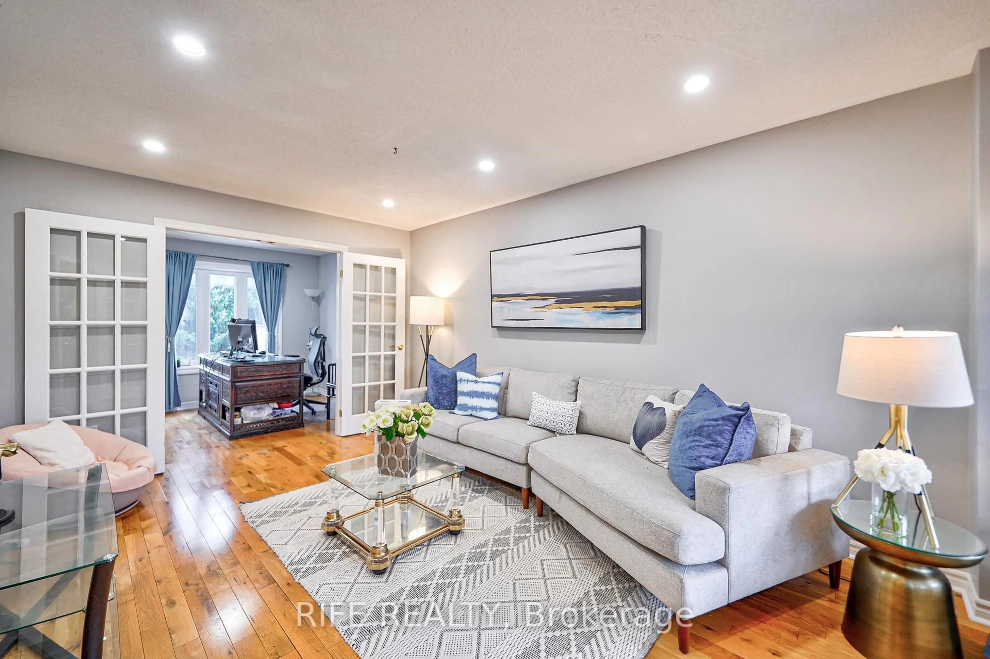 Living room with furniture, wood/laminate floor for 51 Kraus Rd, Barrie Ontario L4N 0N5