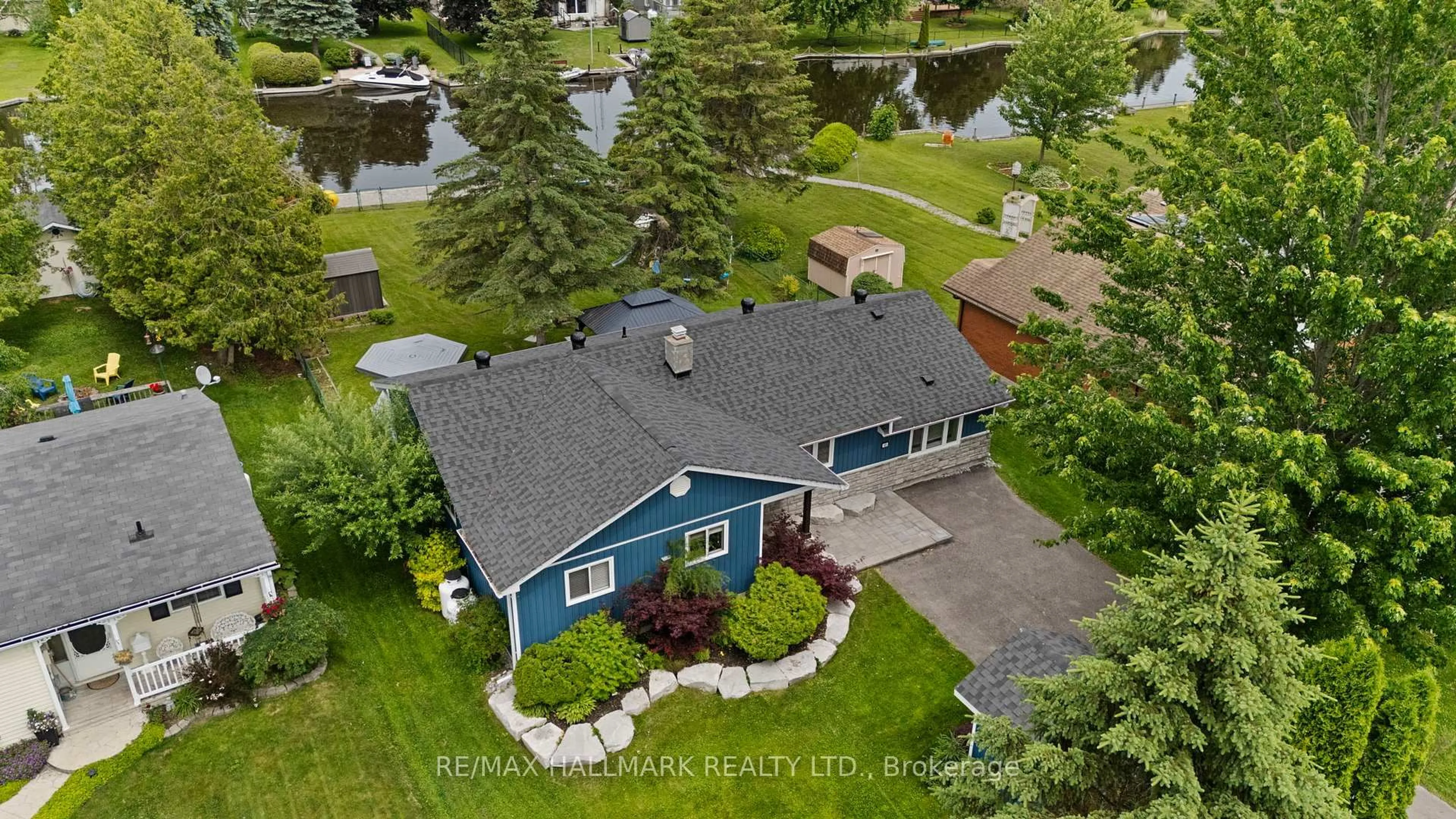A pic from outside/outdoor area/front of a property/back of a property/a pic from drone, water/lake/river/ocean view for 13 Pinetree Crt, Ramara Ontario L0K 1B0