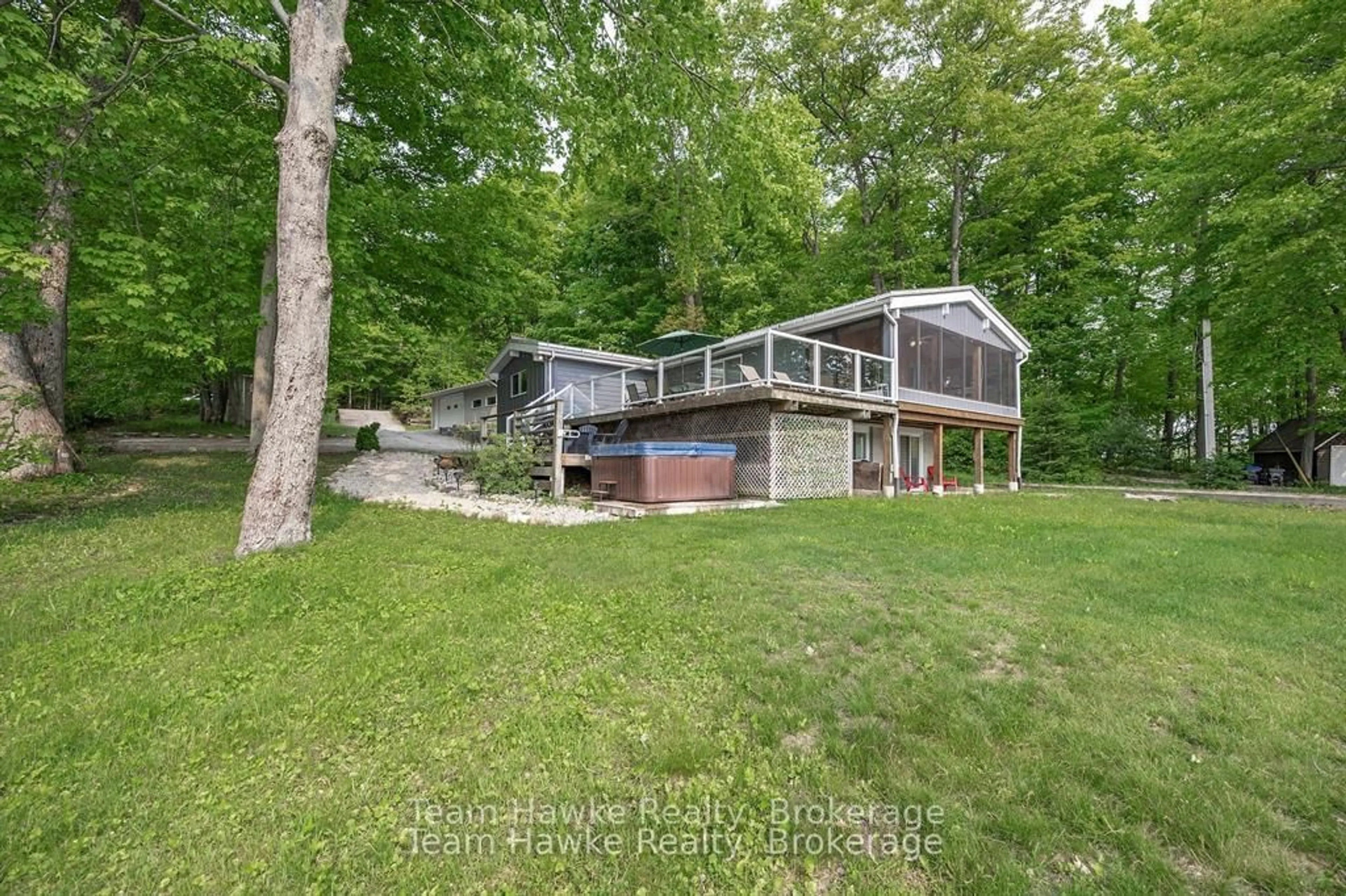 A pic from outside/outdoor area/front of a property/back of a property/a pic from drone, water/lake/river/ocean view for 23 Timcourt Dr, Tiny Ontario L9M 0B9