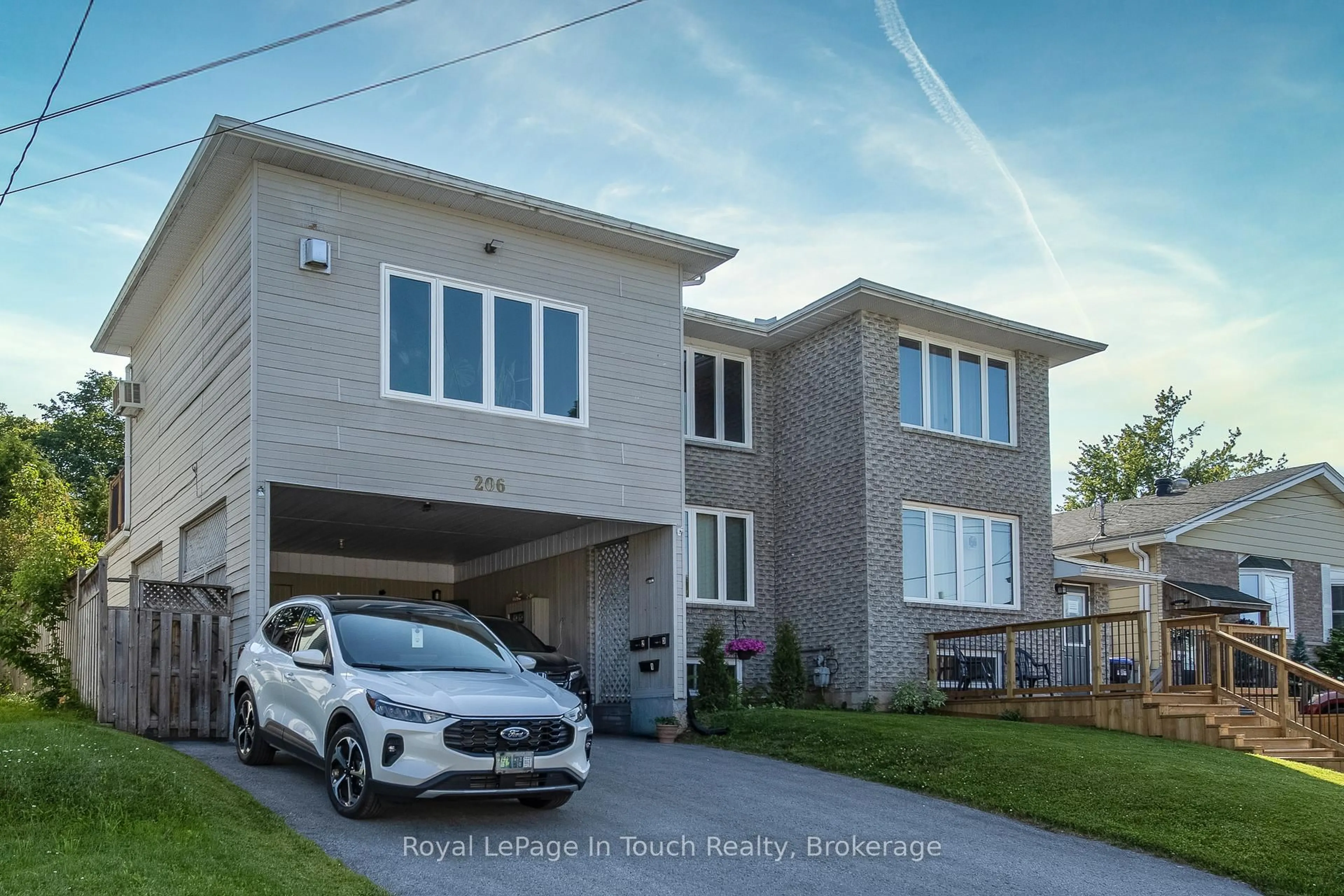 Home with brick exterior material, street for 206 Lindsay St, Midland Ontario L4R 2T9