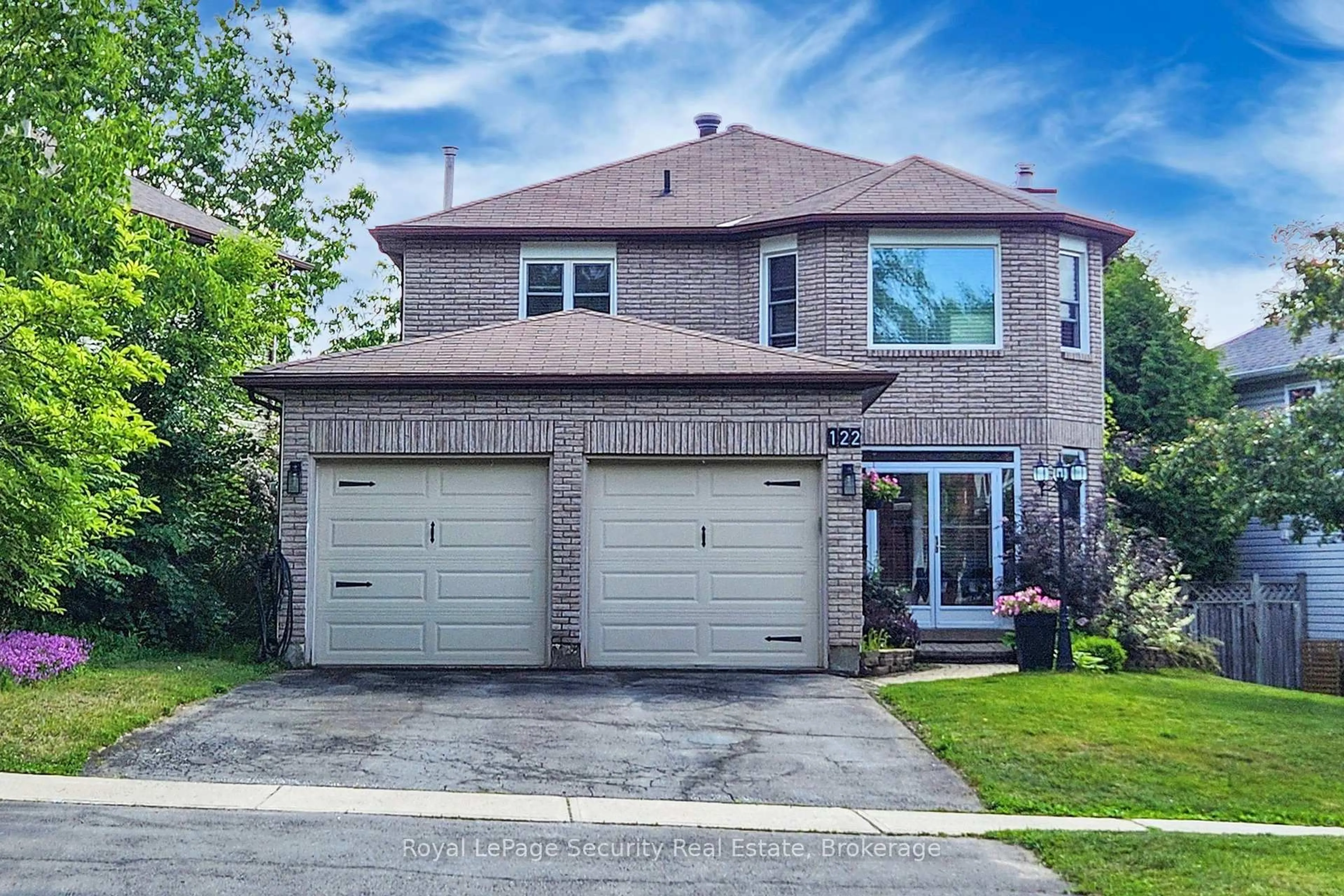 Home with brick exterior material, street for 122 Browning Tr, Barrie Ontario L4N 6R3