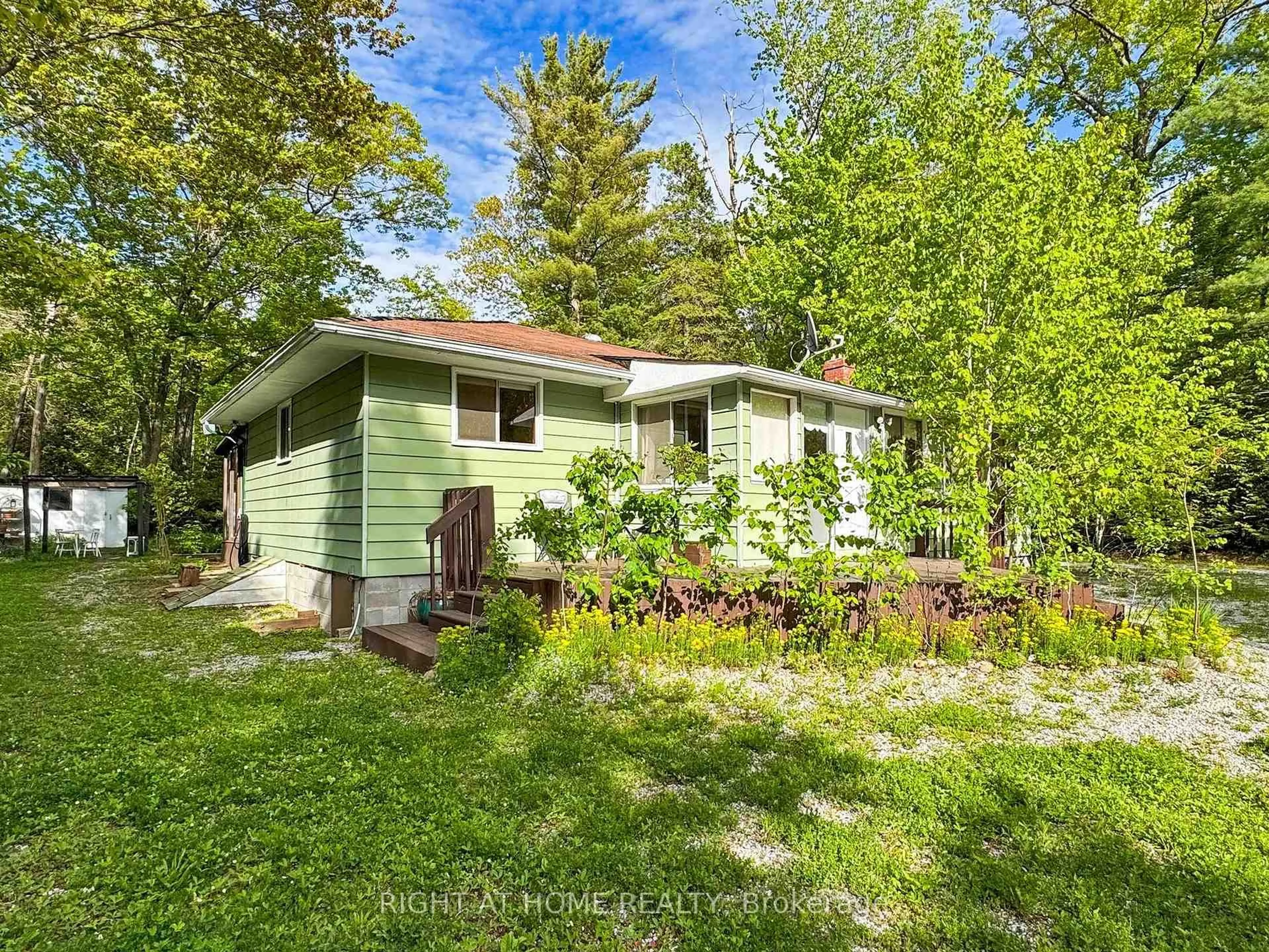A pic from outside/outdoor area/front of a property/back of a property/a pic from drone, forest/trees view for 39 Rue  Jules  Leger St, Tiny Ontario L9M 0J2