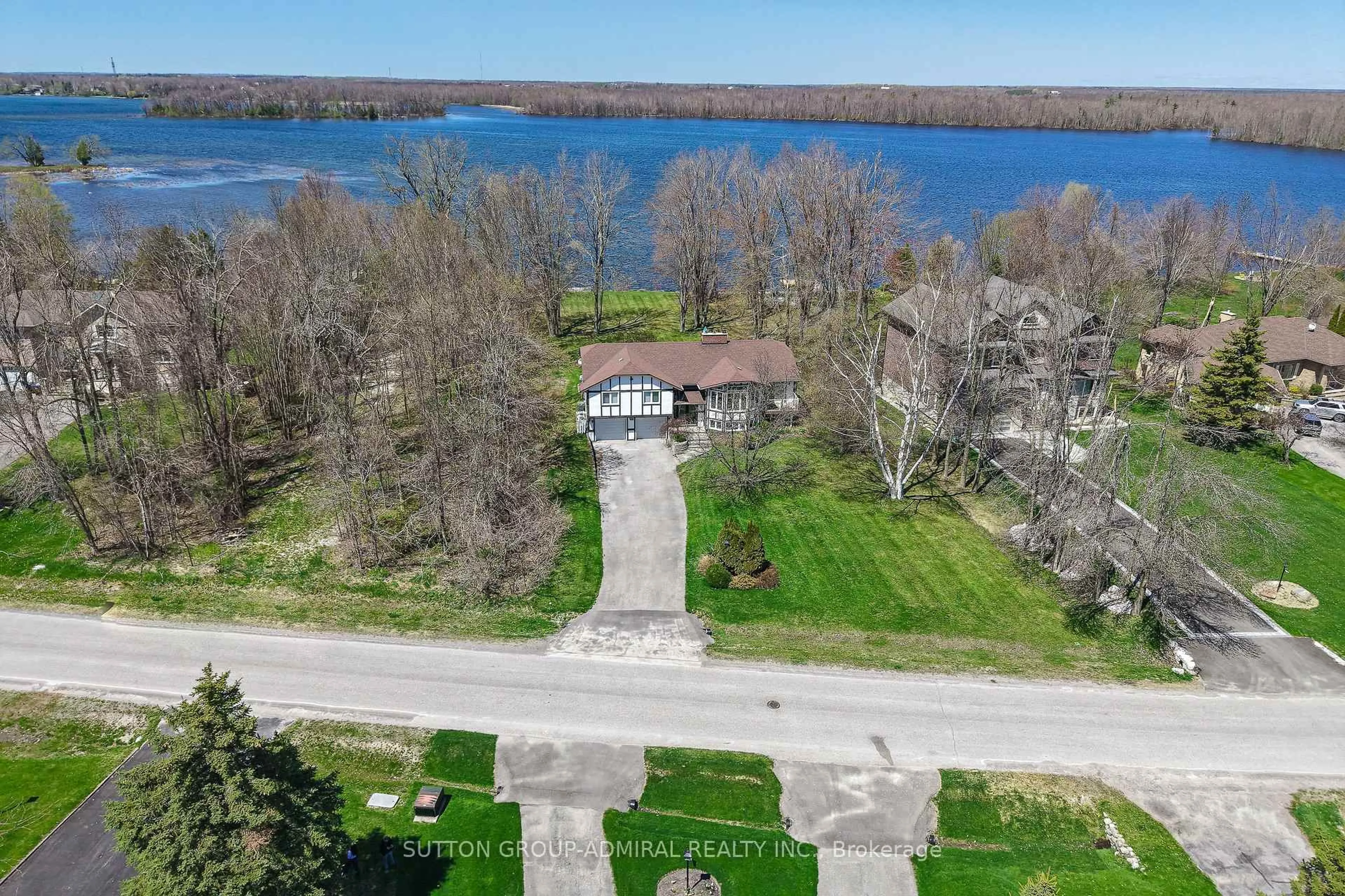 A pic from outside/outdoor area/front of a property/back of a property/a pic from drone, water/lake/river/ocean view for 182 Bayshore Dr, Ramara Ontario L0K 1B0