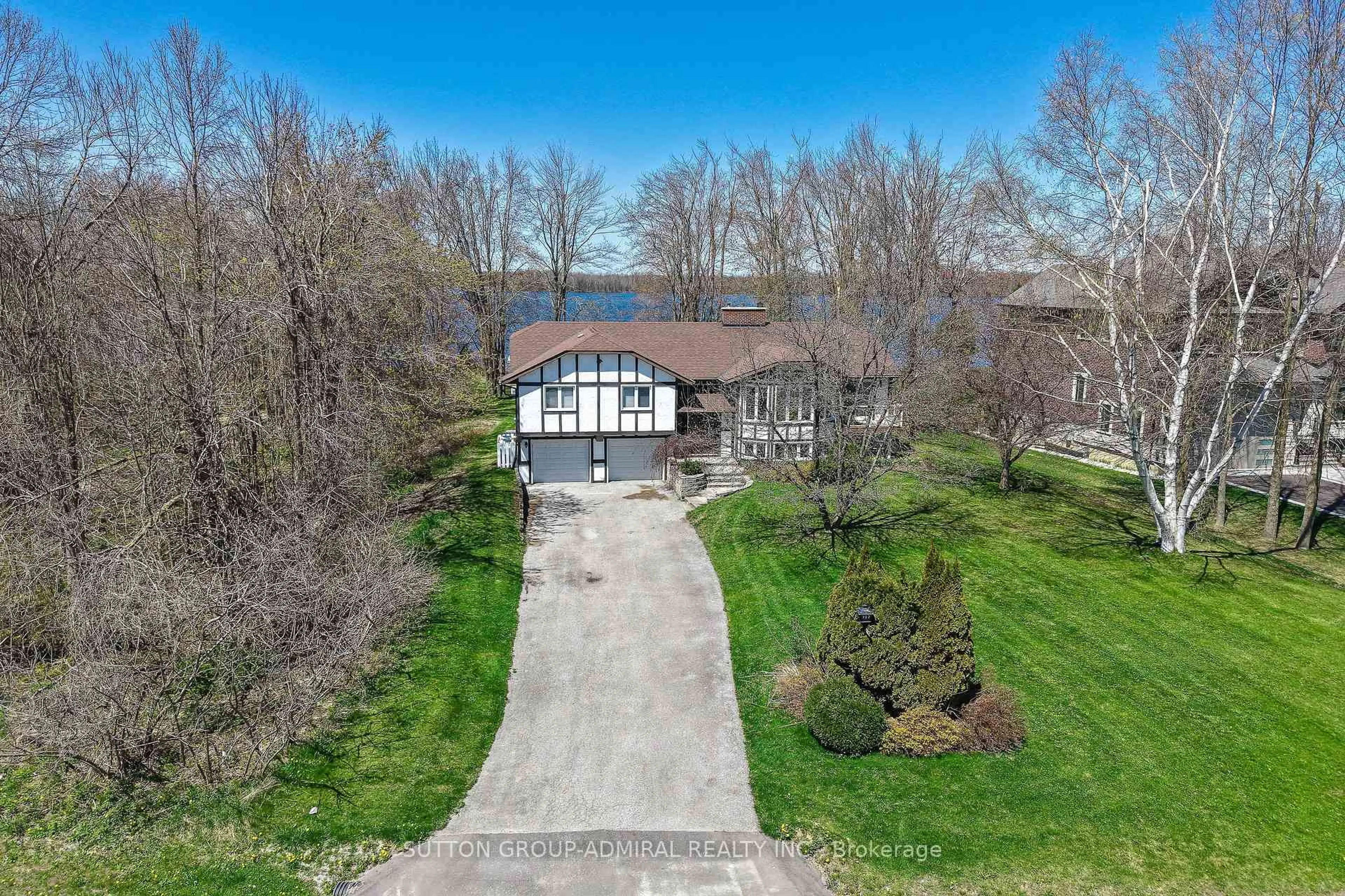 A pic from outside/outdoor area/front of a property/back of a property/a pic from drone, water/lake/river/ocean view for 182 Bayshore Dr, Ramara Ontario L0K 1B0