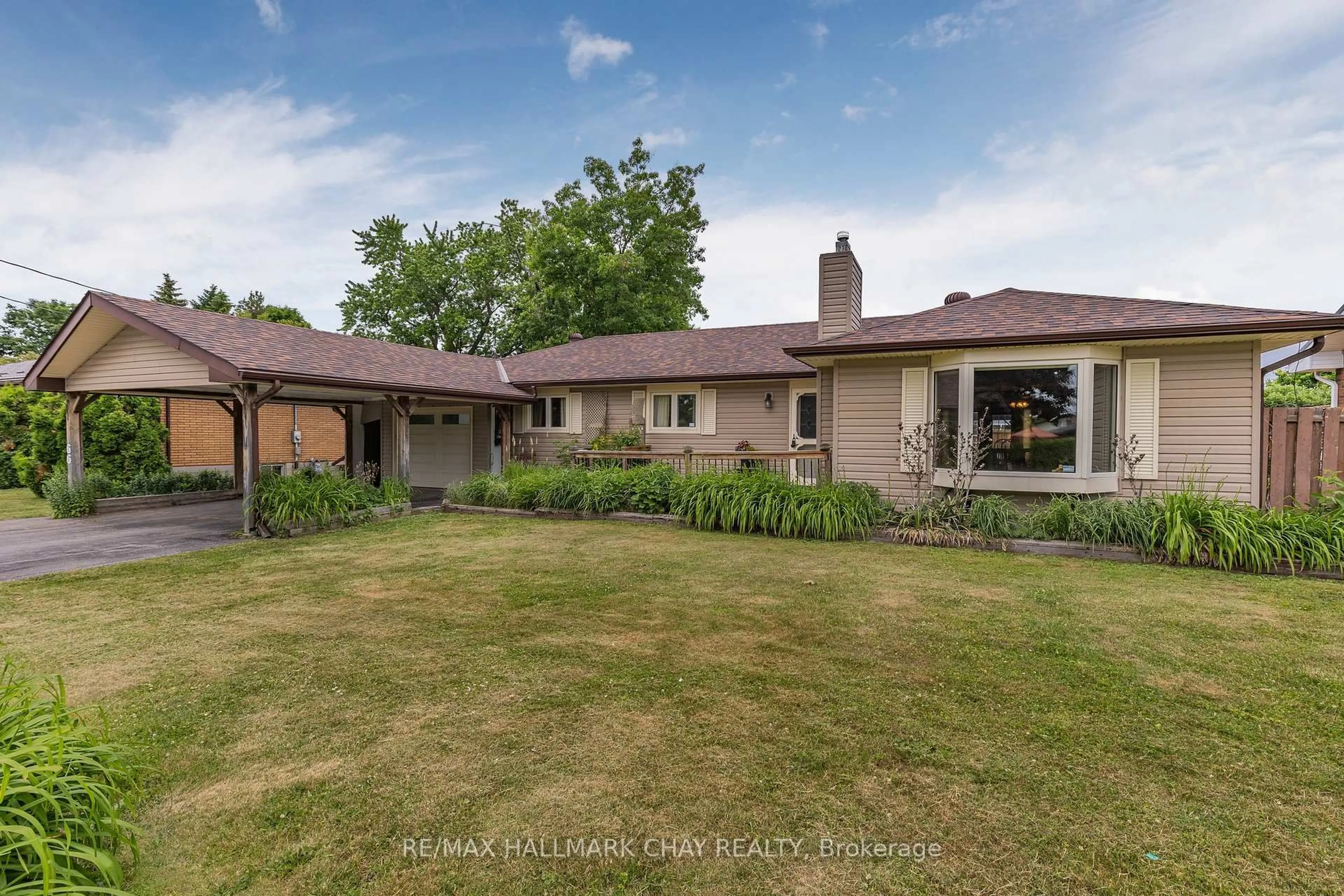 A pic from outside/outdoor area/front of a property/back of a property/a pic from drone, street for 66 Queen St, Springwater Ontario L0L 1P0