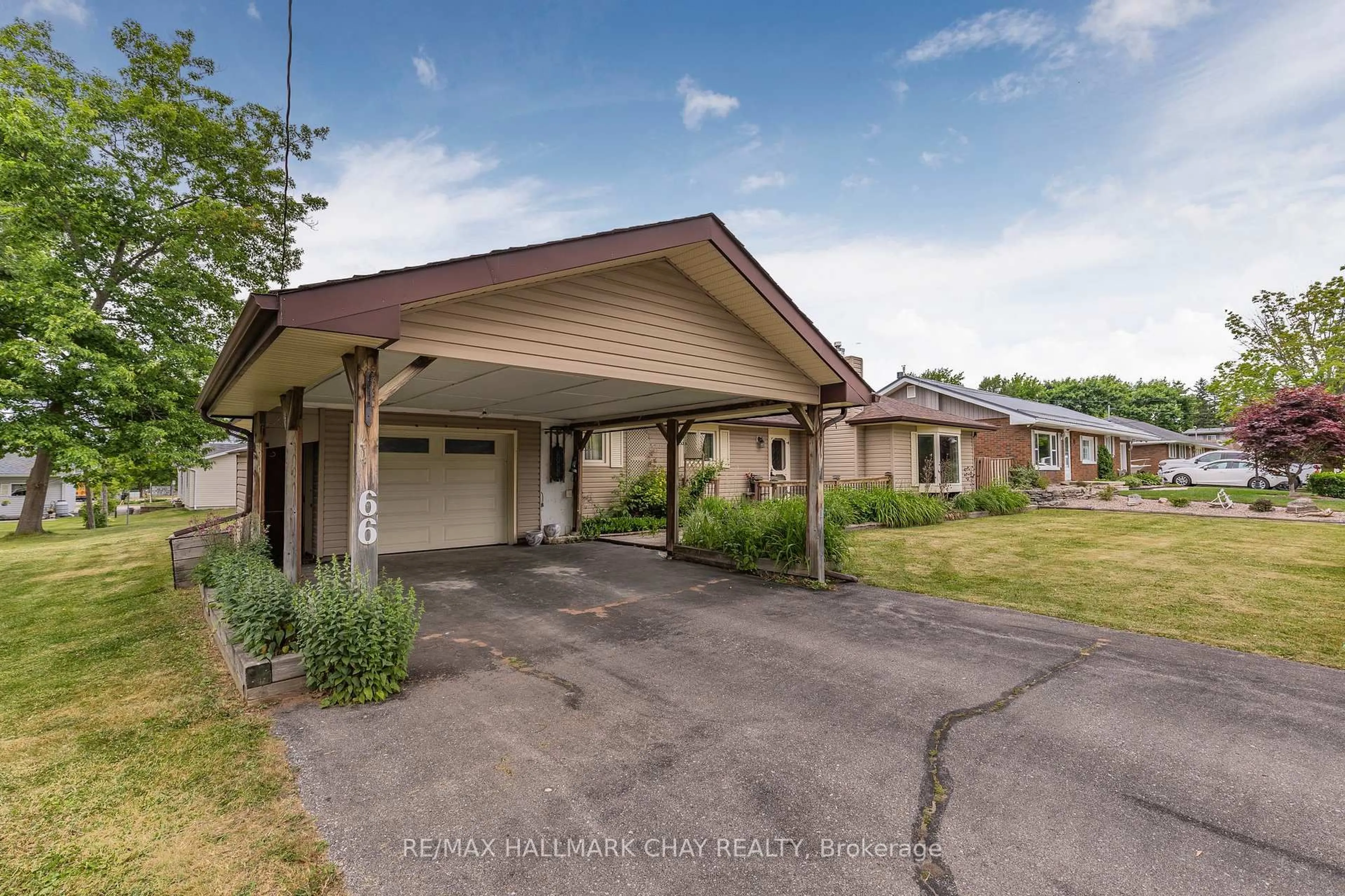 A pic from outside/outdoor area/front of a property/back of a property/a pic from drone, street for 66 Queen St, Springwater Ontario L0L 1P0