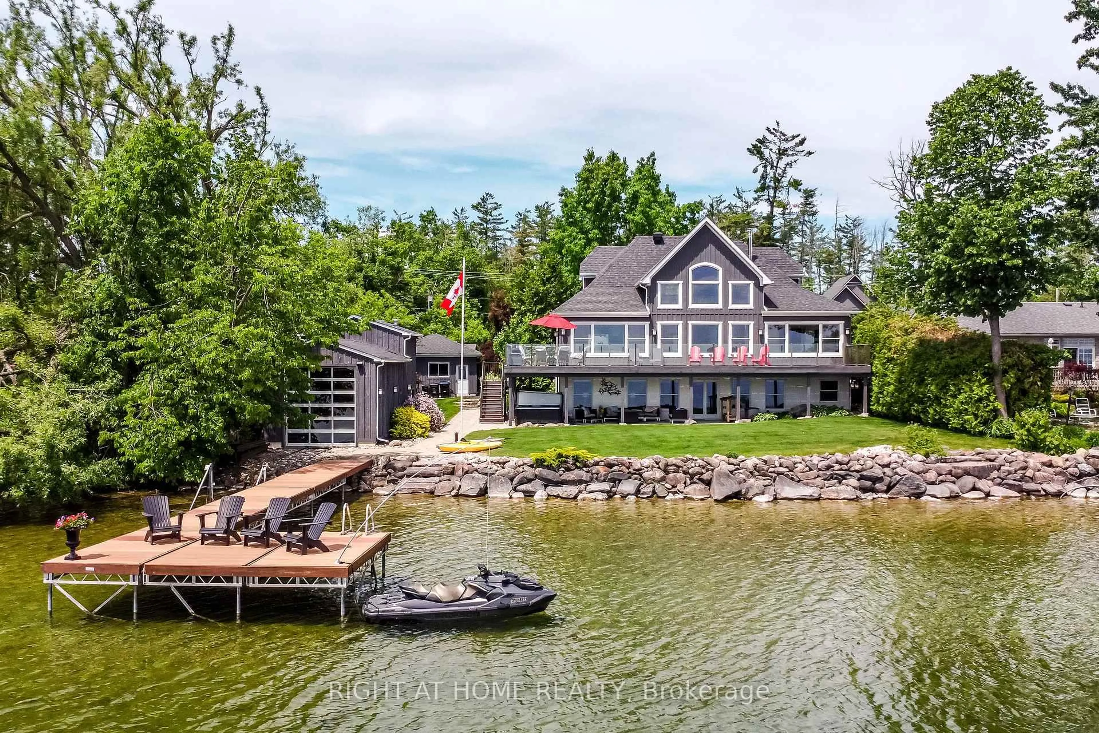 A pic from outside/outdoor area/front of a property/back of a property/a pic from drone, water/lake/river/ocean view for 21 Lakeshore Rd, Oro-Medonte Ontario L0L 2E0