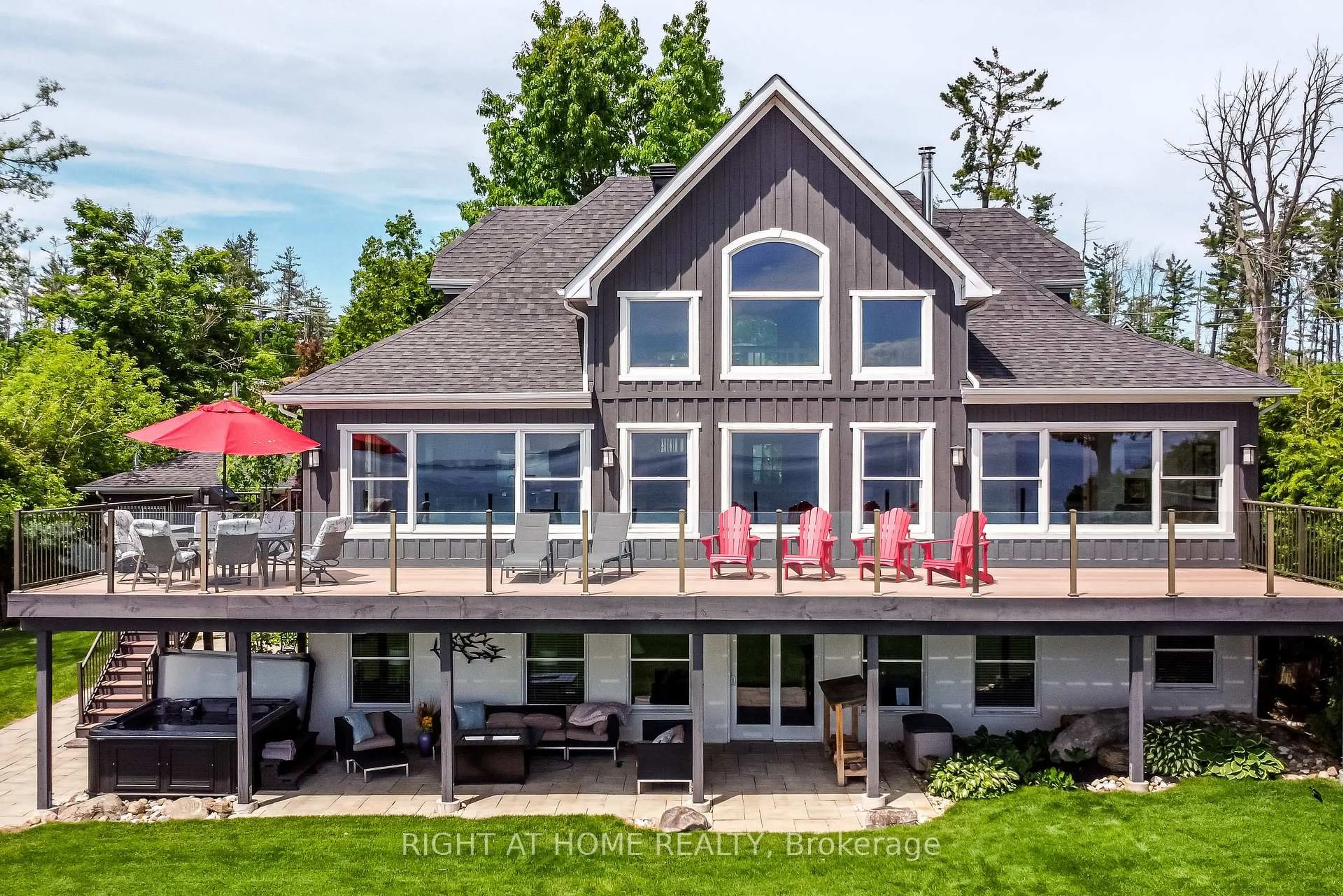 A pic from outside/outdoor area/front of a property/back of a property/a pic from drone, water/lake/river/ocean view for 21 Lakeshore Rd, Oro-Medonte Ontario L0L 2E0