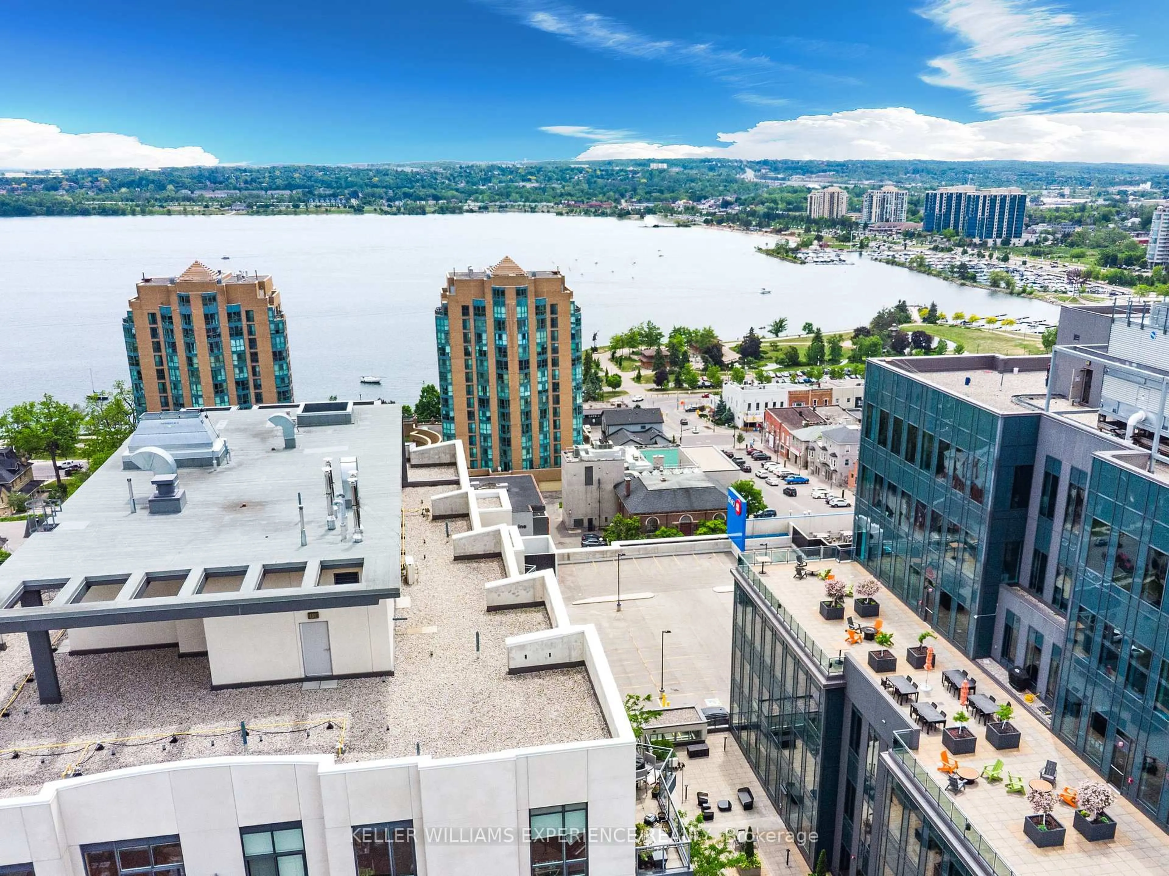 A pic from outside/outdoor area/front of a property/back of a property/a pic from drone, city buildings view from balcony for 111 Worsley St #GPH1, Barrie Ontario L4M 0J5