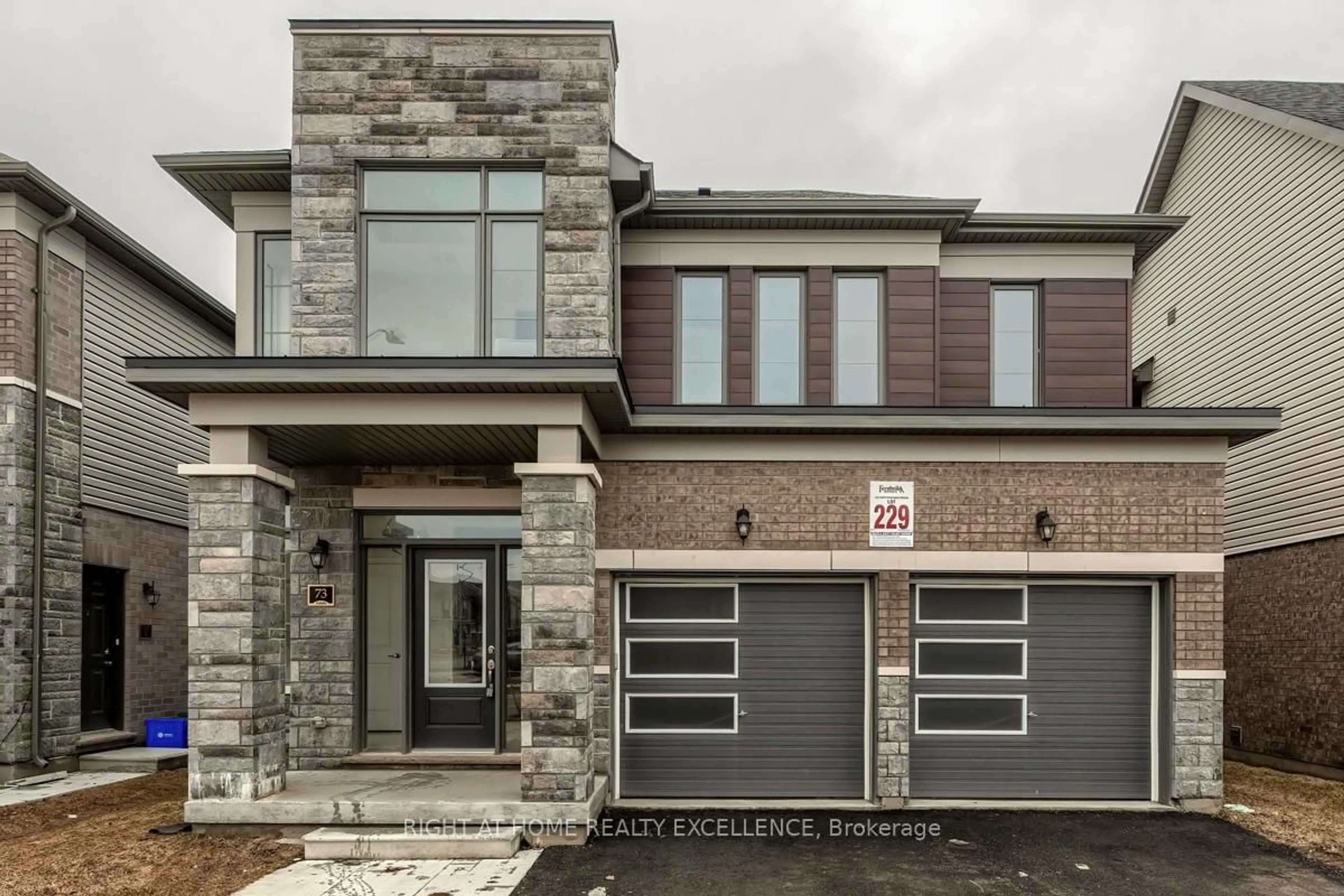 Home with brick exterior material, street for 73 Nottingham Rd, Barrie Ontario L9J 0L3