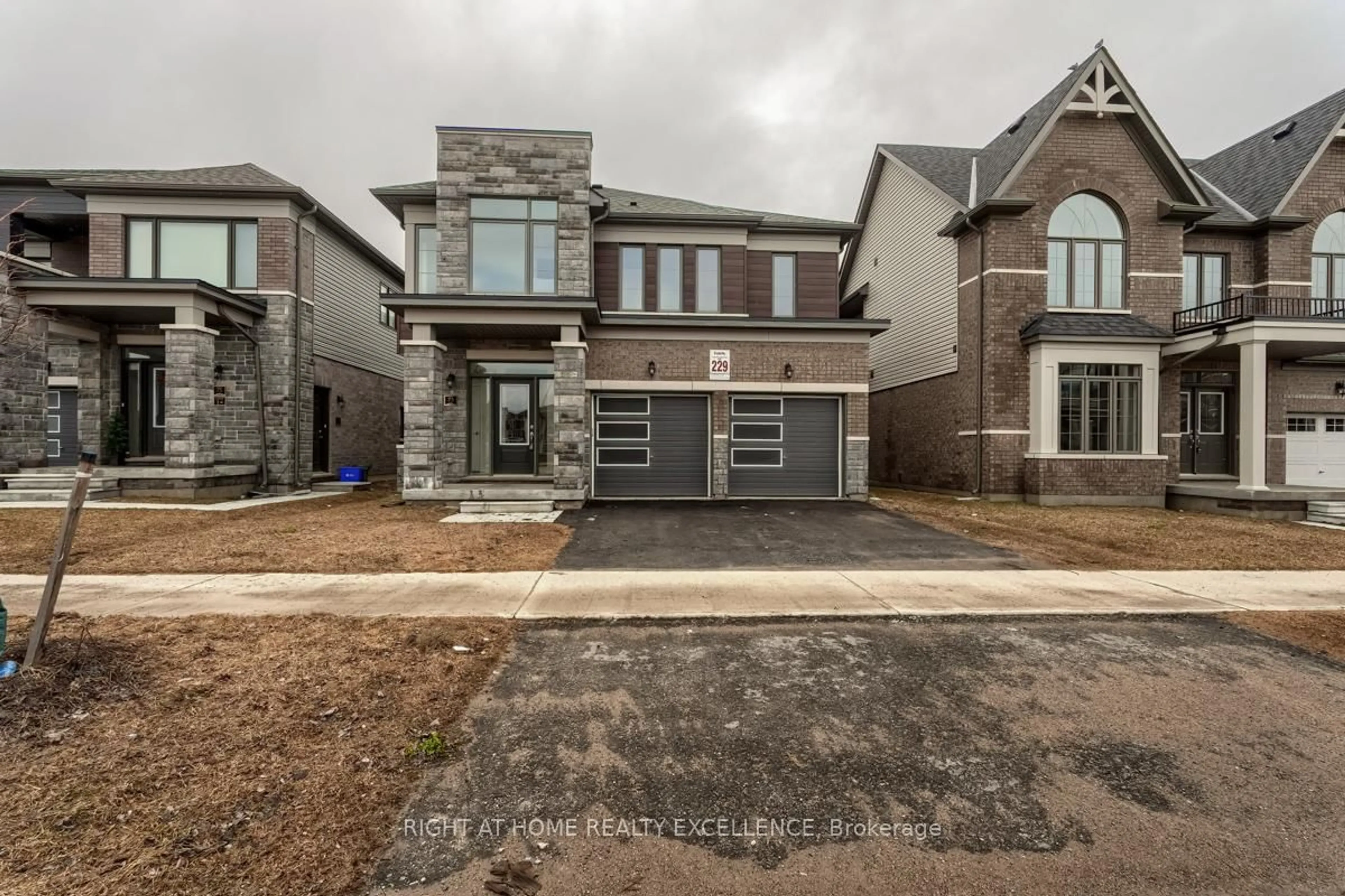 Home with brick exterior material, street for 73 Nottingham Rd, Barrie Ontario L9J 0L3