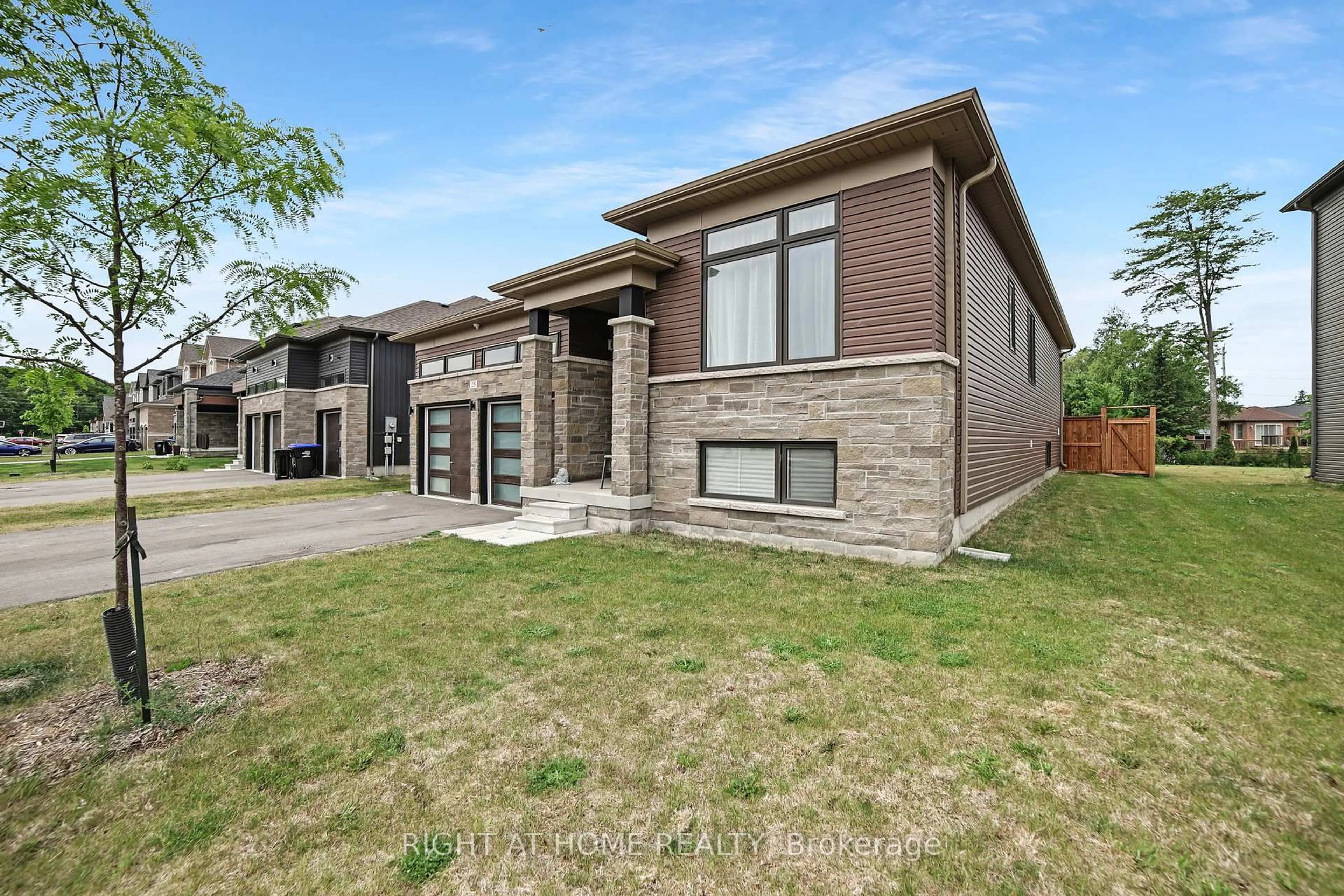Home with brick exterior material, street for 25 Beatrice Dr, Wasaga Beach Ontario L9Z 0L3