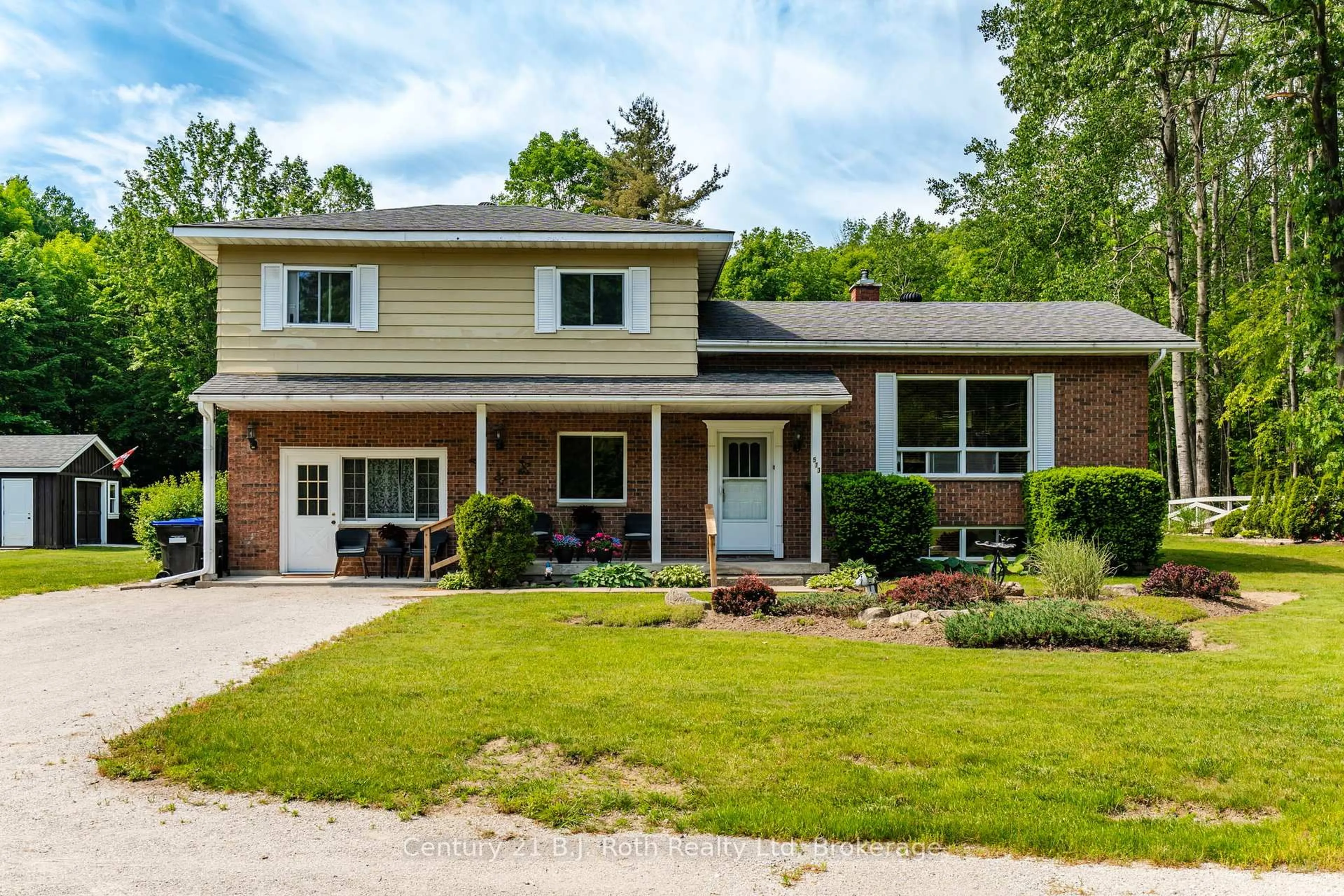 Home with brick exterior material, street for 573 Lafontaine Rd, Tiny Ontario L9M 0S3