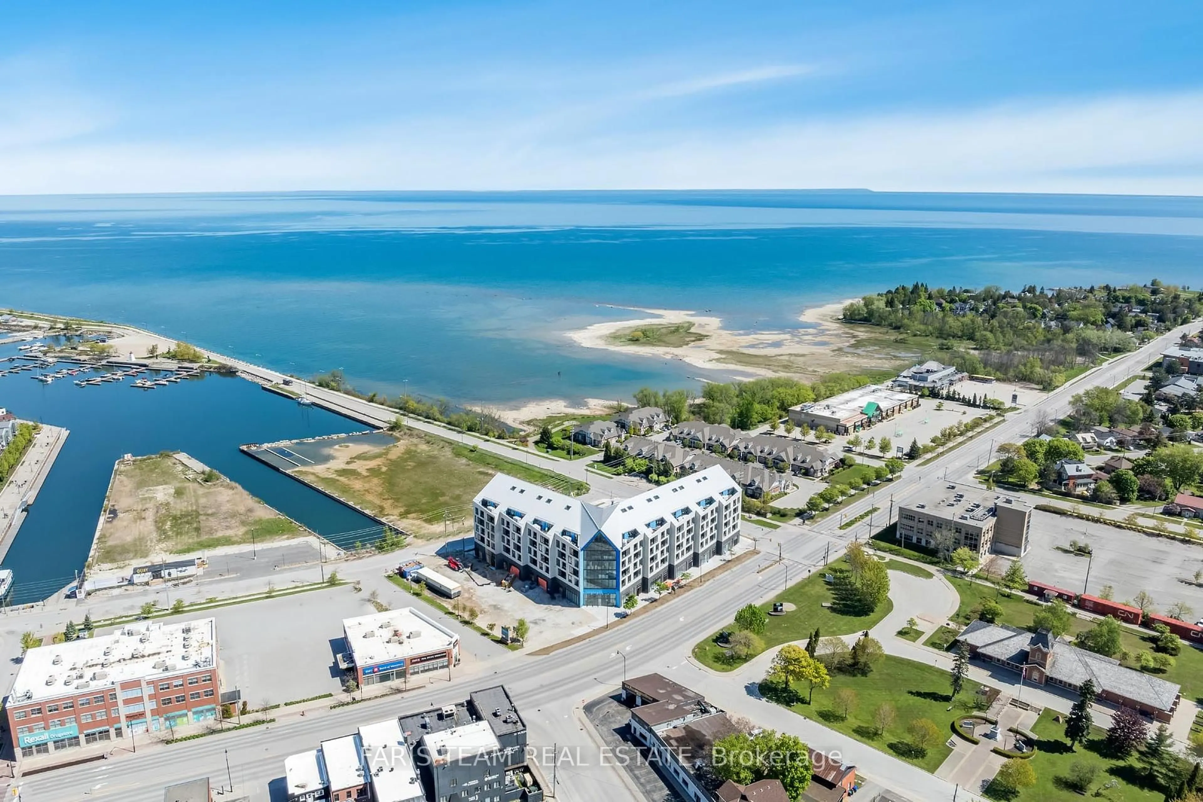 A pic from outside/outdoor area/front of a property/back of a property/a pic from drone, water/lake/river/ocean view for 31 Huron St #609, Collingwood Ontario L9Y 1C3