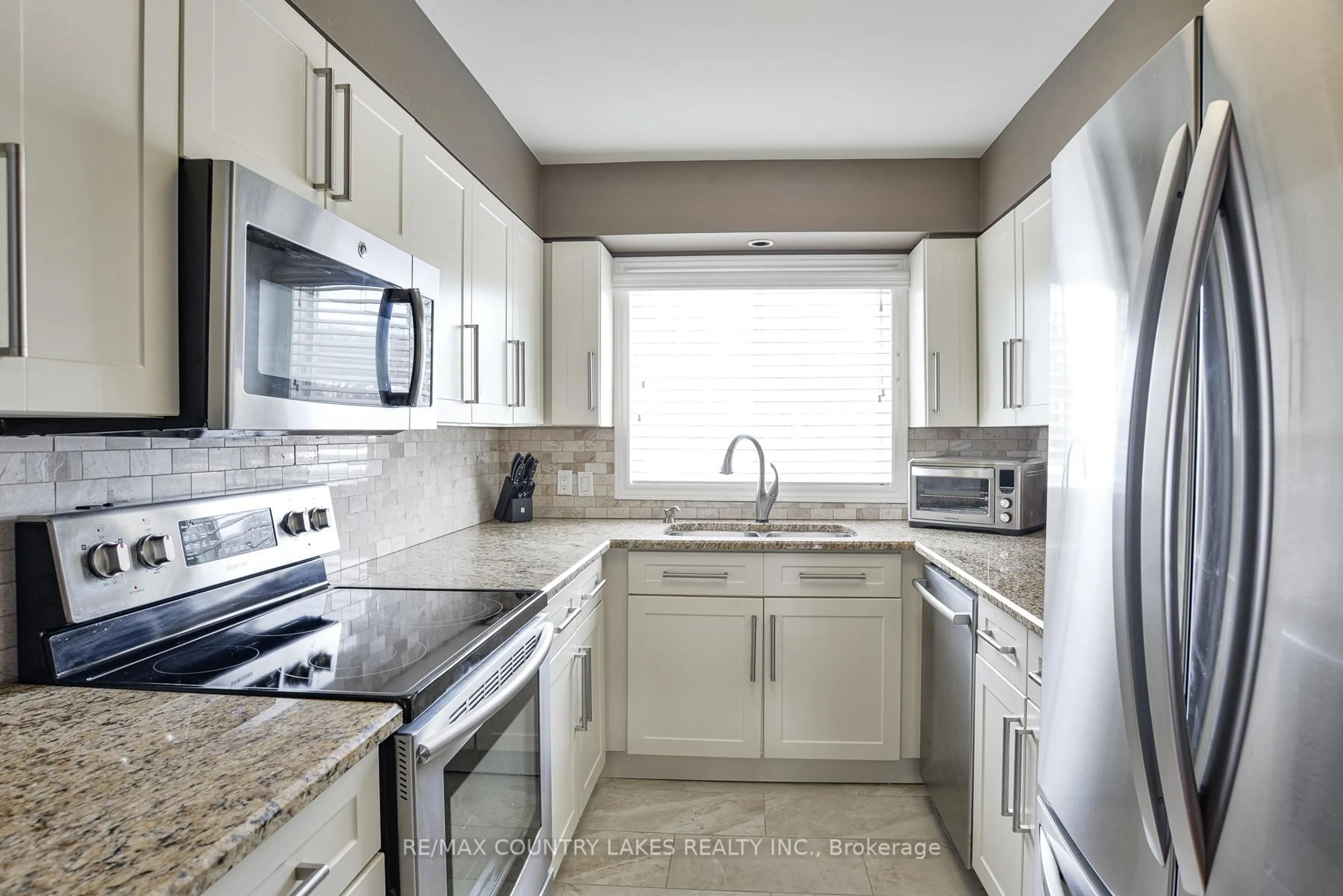 Standard kitchen, ceramic/tile floor for 24 Laguna Pkwy #15, Ramara Ontario L0K 1B0