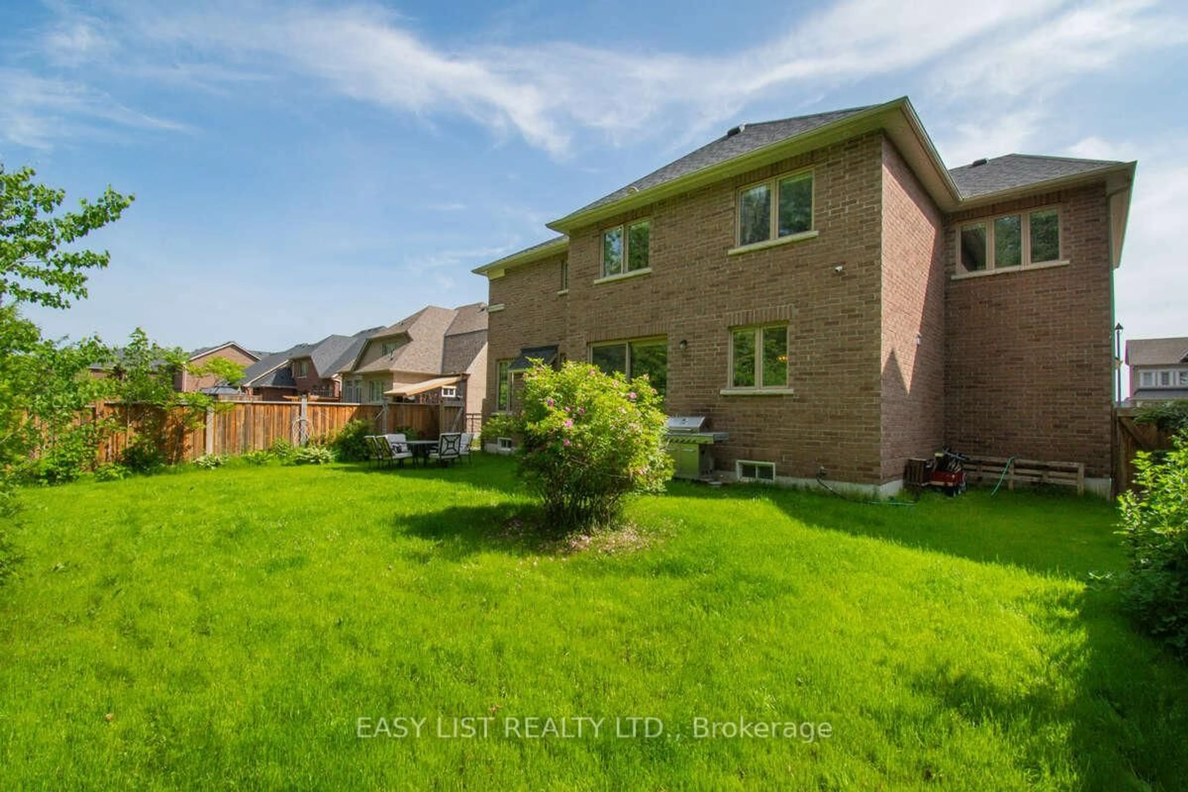 Home with brick exterior material, street for 61 Trail Blvd, Springwater Ontario L9X 0S4