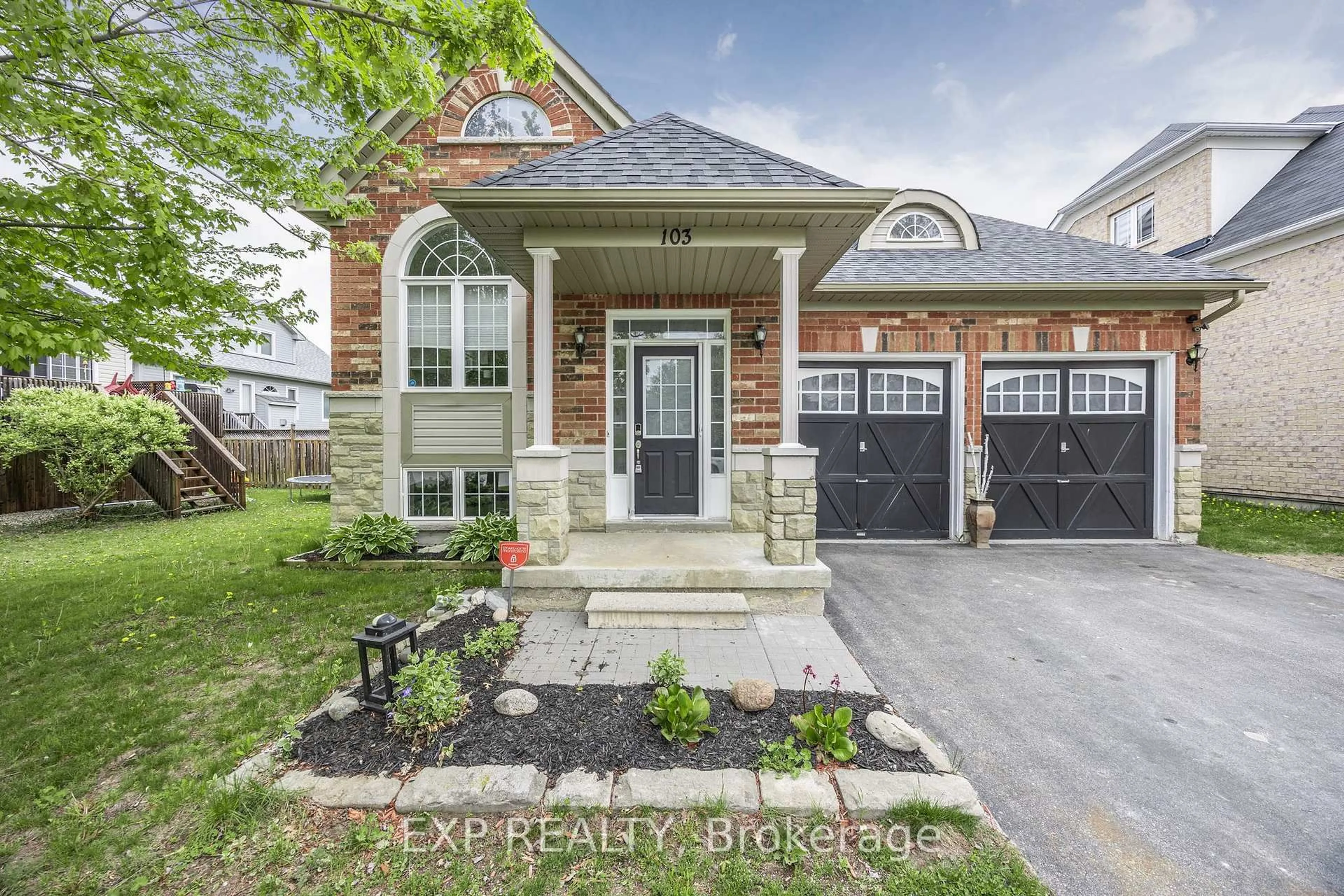 Home with brick exterior material, street for 103 41st St, Wasaga Beach Ontario L9Z 3B7