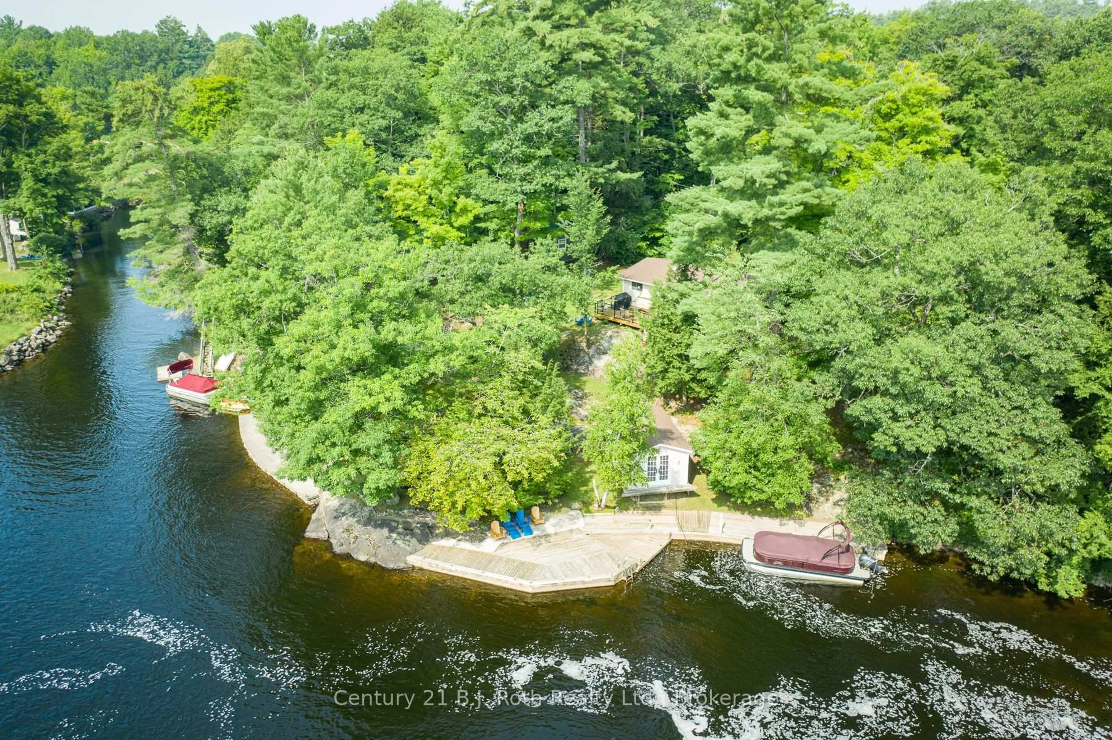 A pic from outside/outdoor area/front of a property/back of a property/a pic from drone, water/lake/river/ocean view for 5335 Claresbridge Lane, Severn Ontario L0K 2B0
