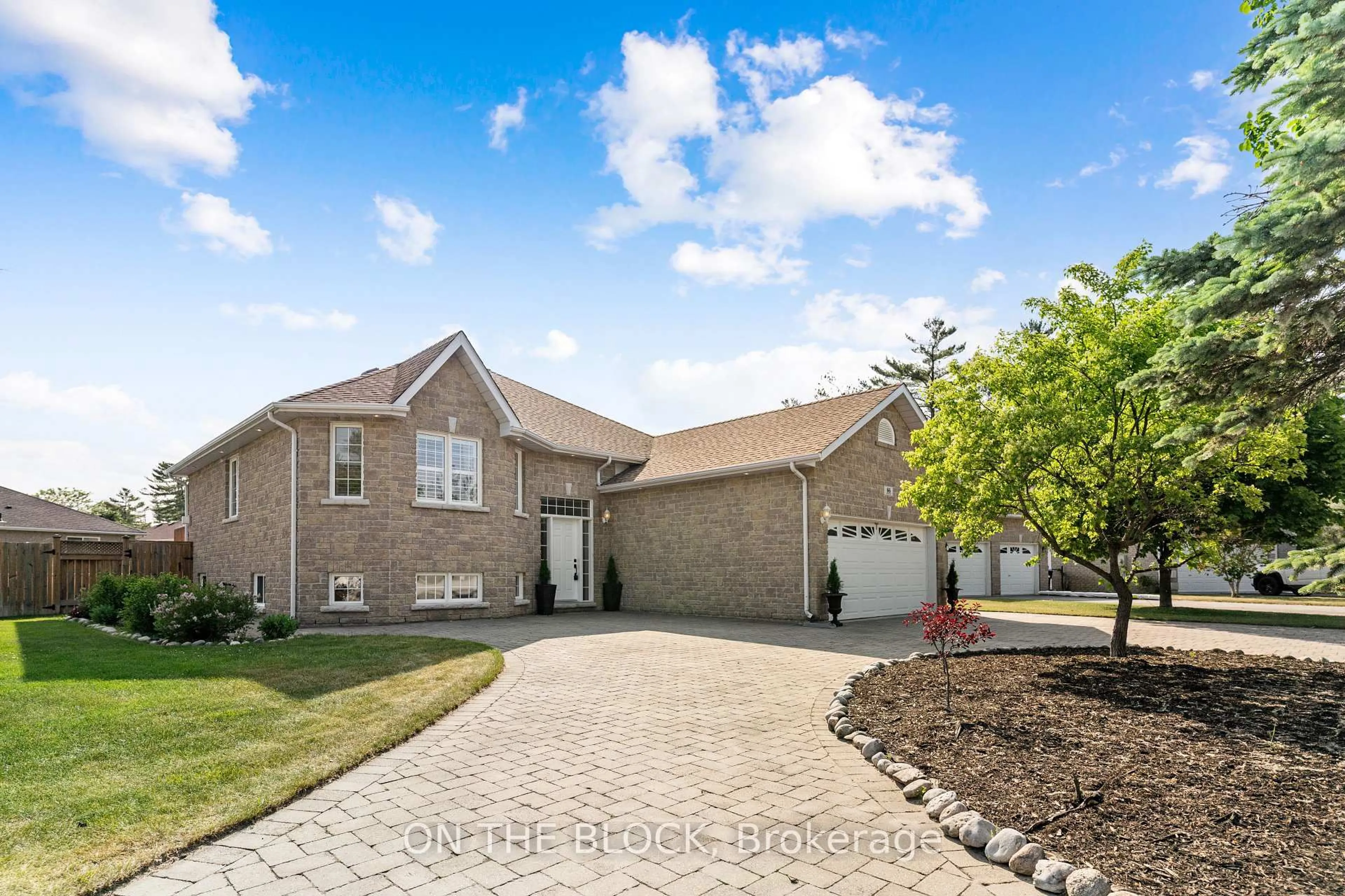 Home with brick exterior material, street for 66 Donato Way, Wasaga Beach Ontario L9Z 1R9