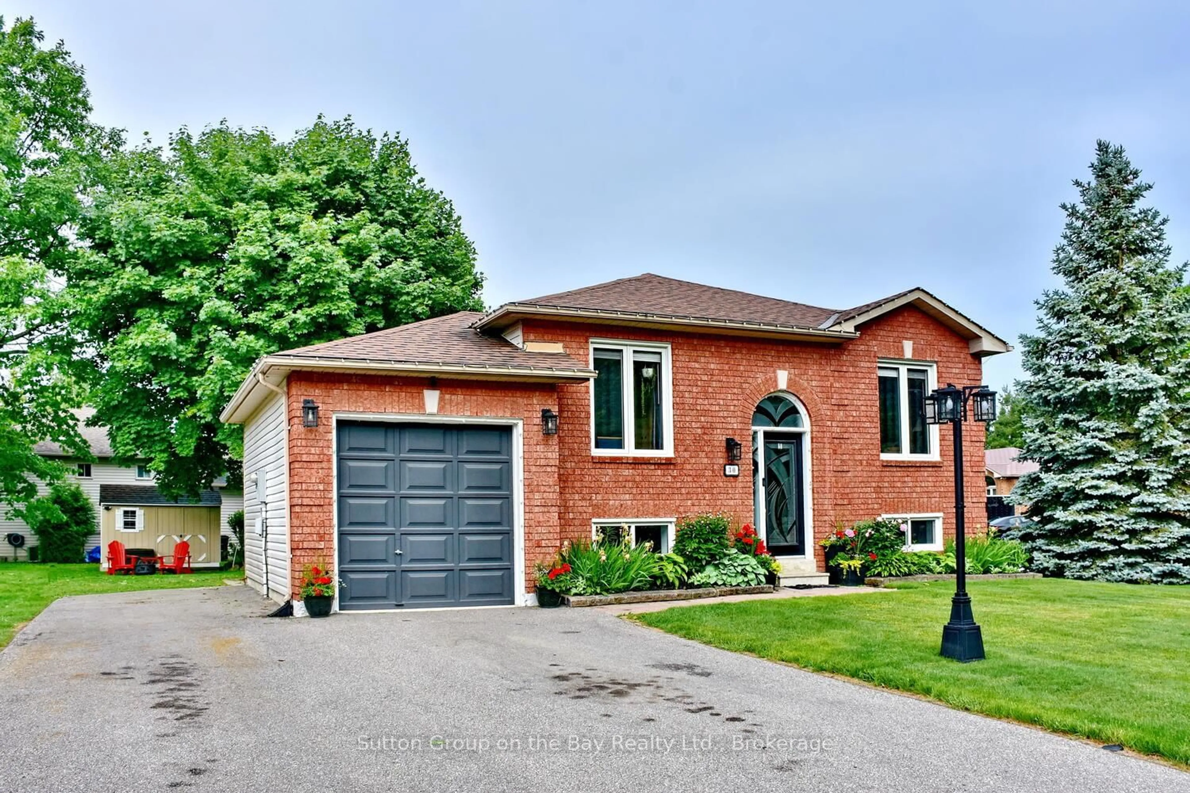 Home with brick exterior material, street for 30 Acorn Cres, Wasaga Beach Ontario L9Z 1L6