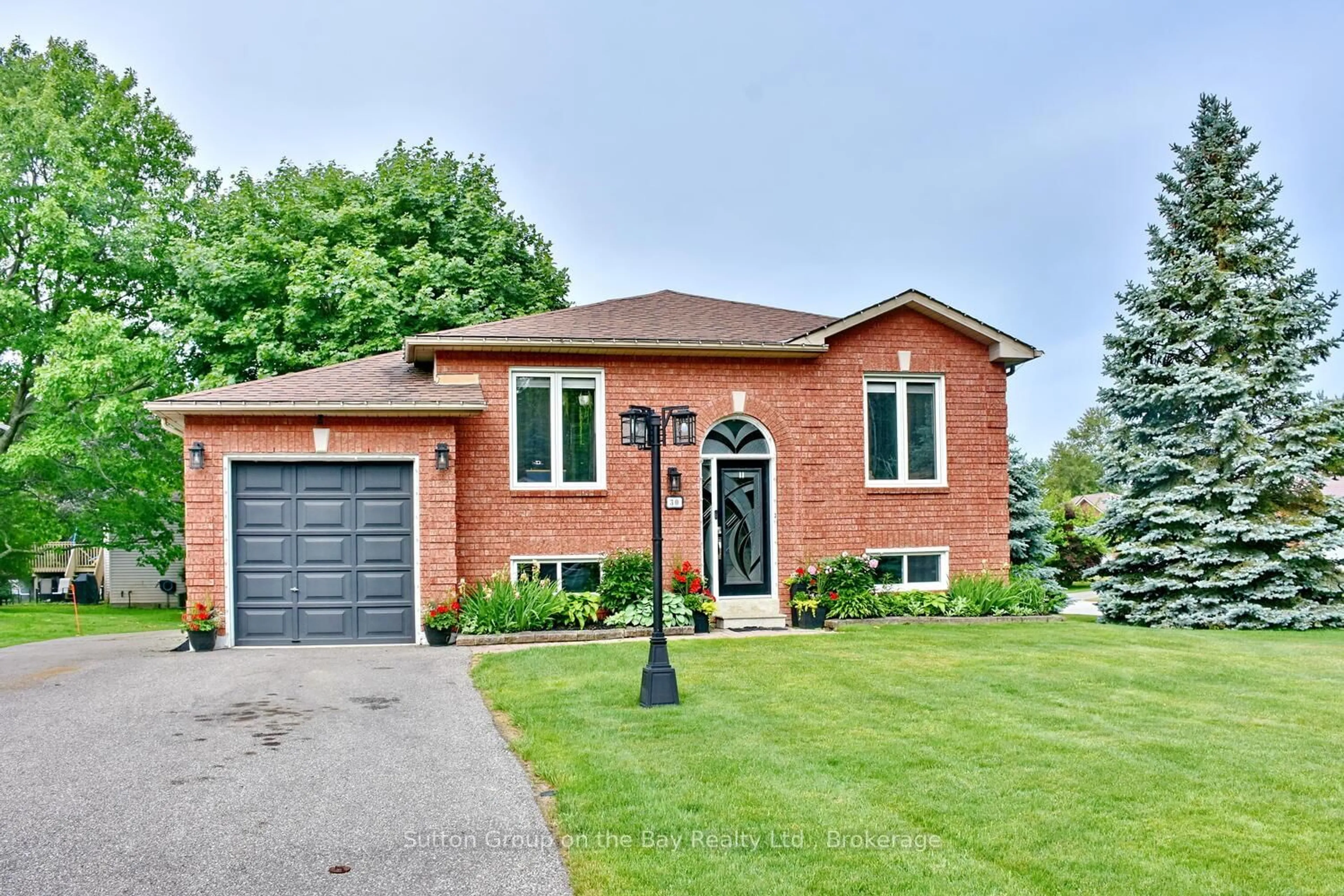 Home with brick exterior material, street for 30 Acorn Cres, Wasaga Beach Ontario L9Z 1L6