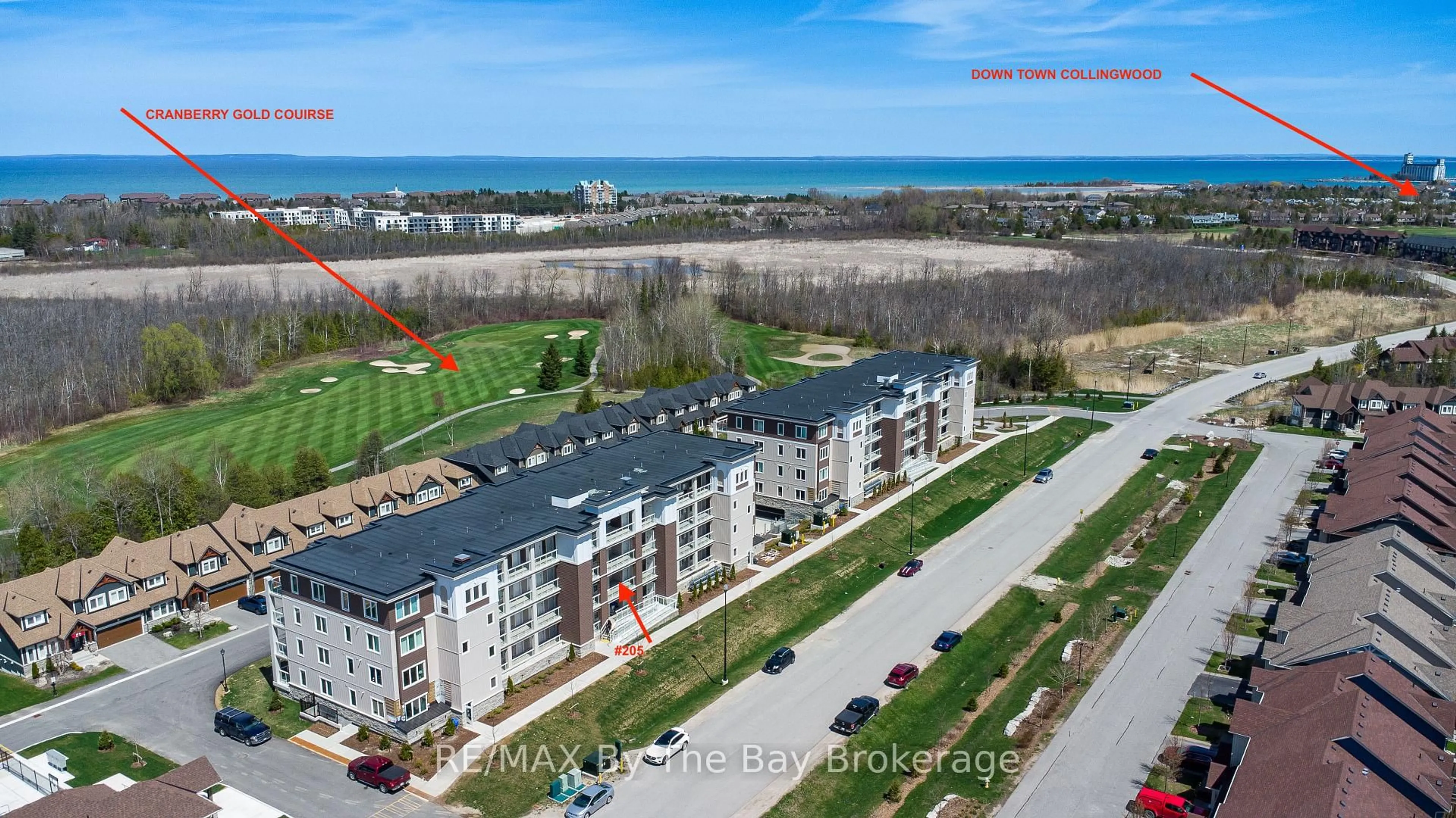 A pic from outside/outdoor area/front of a property/back of a property/a pic from drone, water/lake/river/ocean view for 17 Spooner Cres #205, Collingwood Ontario L9Y 1T3