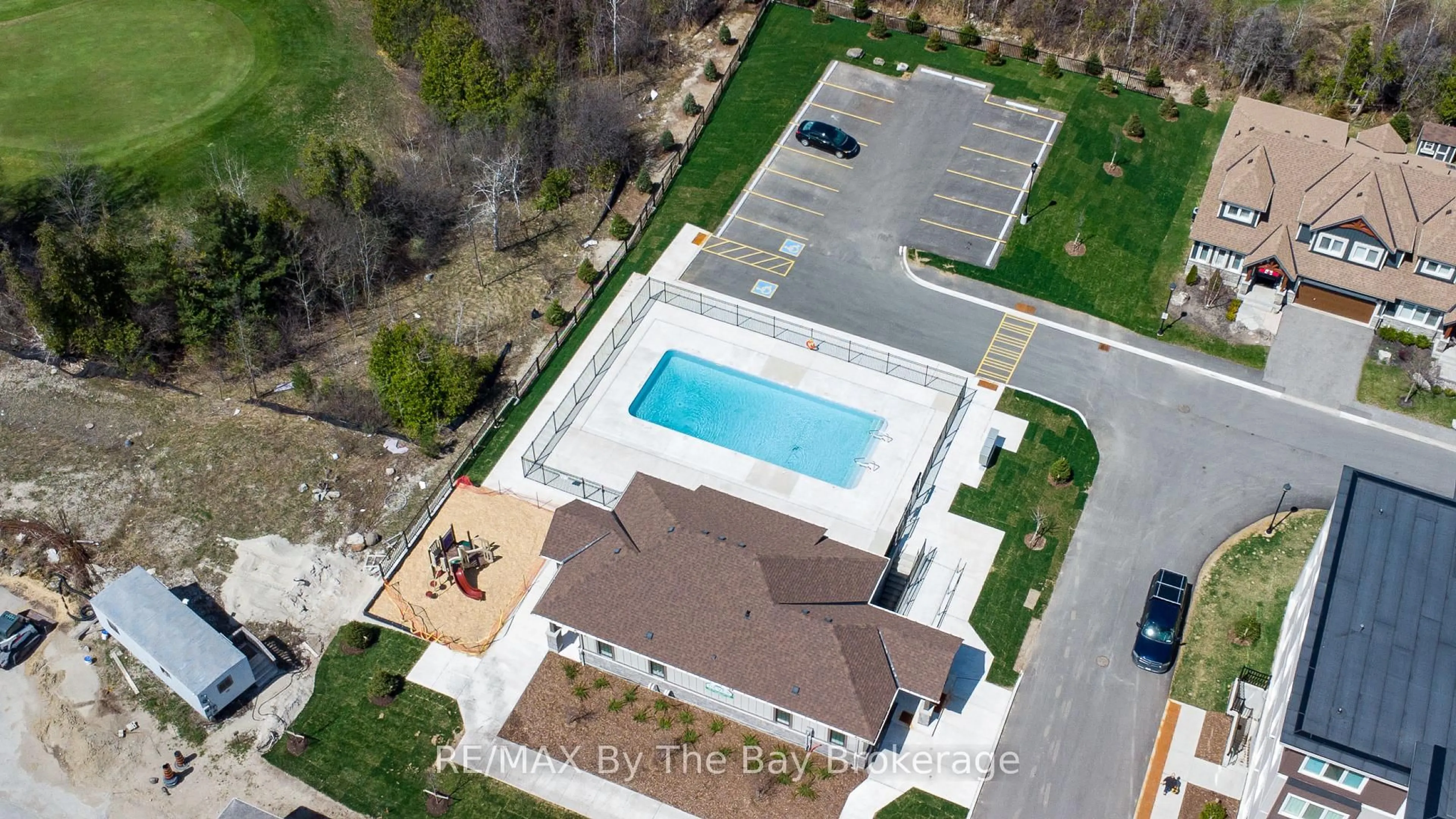 A pic from outside/outdoor area/front of a property/back of a property/a pic from drone, street for 17 Spooner Cres #205, Collingwood Ontario L9Y 1T3