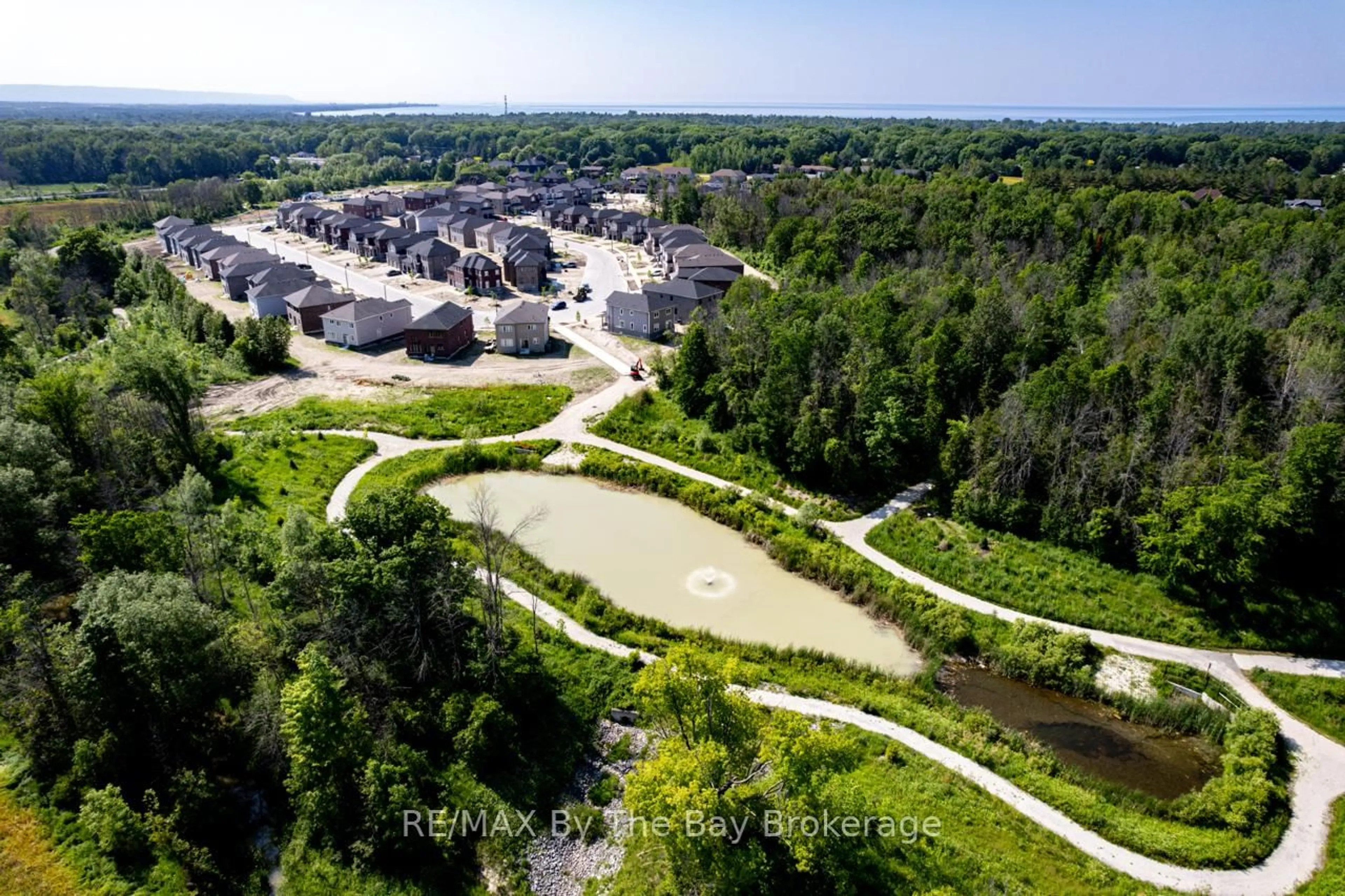 A pic from outside/outdoor area/front of a property/back of a property/a pic from drone, water/lake/river/ocean view for 3 Misty Ridge Rd, Wasaga Beach Ontario L9Z 0R8