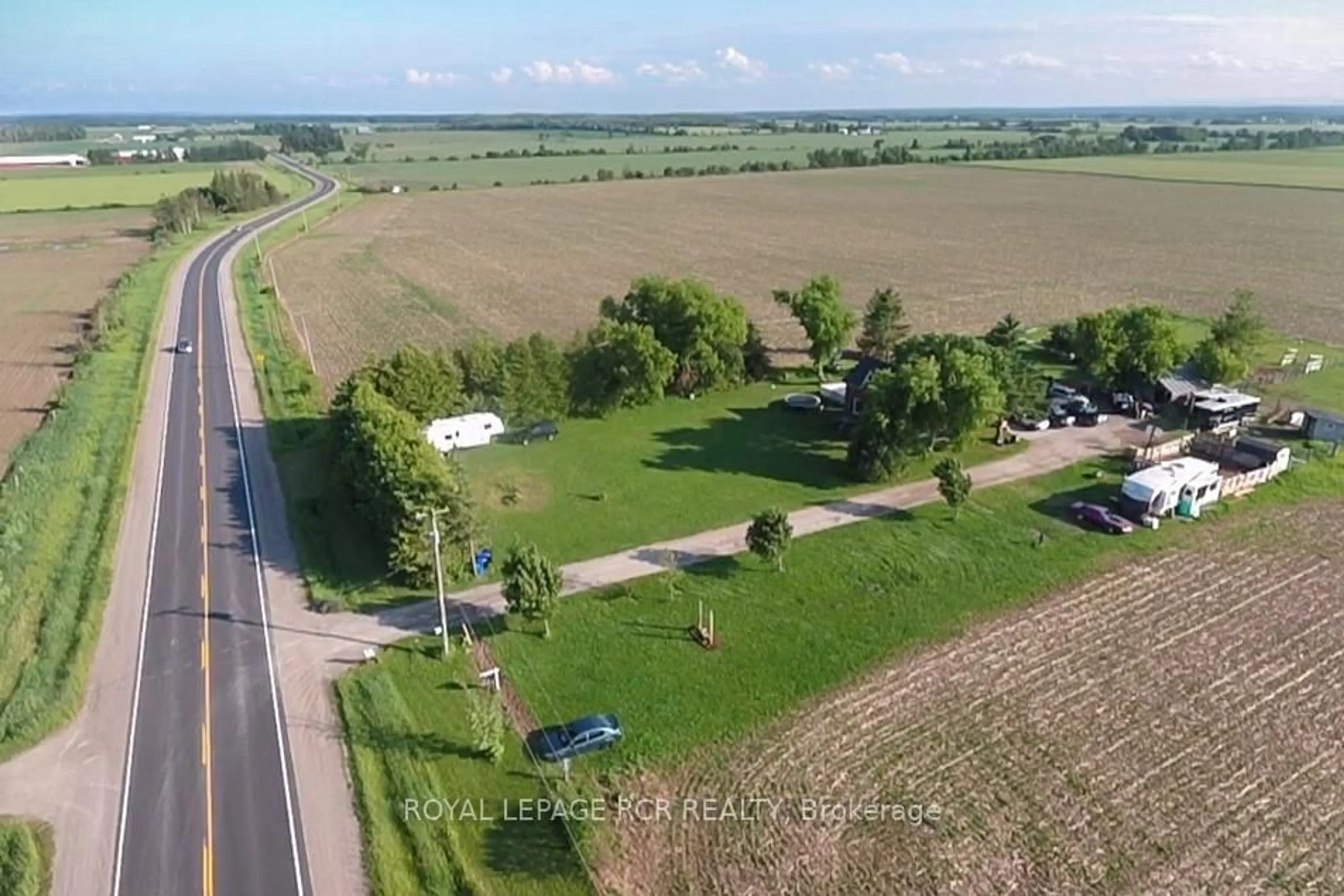 A pic from outside/outdoor area/front of a property/back of a property/a pic from drone, street for 2606 Crossland Rd, Springwater Ontario L0L 1P0