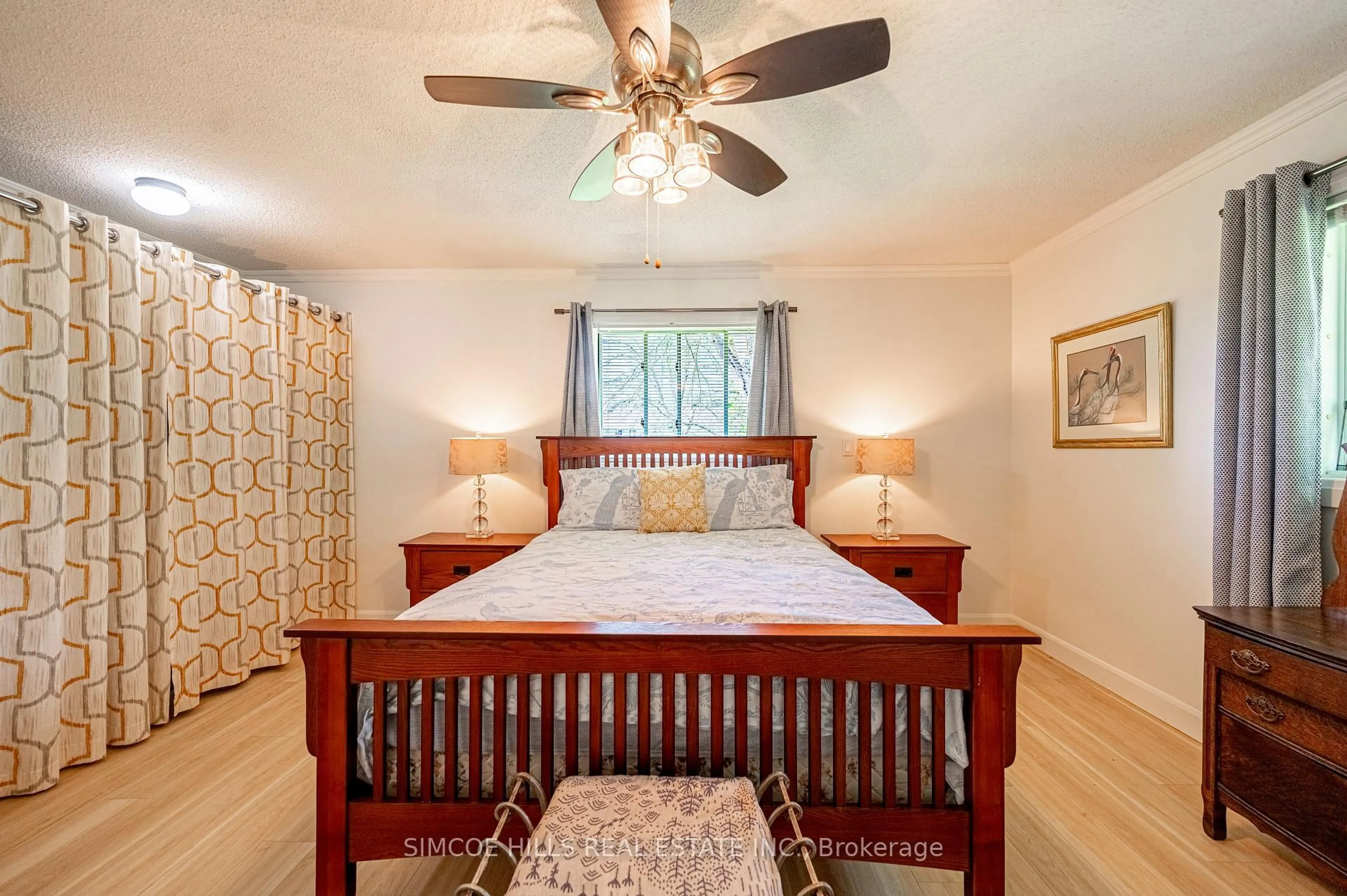 Bedroom with bed, wood/laminate floor for 11 Sheridan Dr, Severn Ontario L0K 1E0