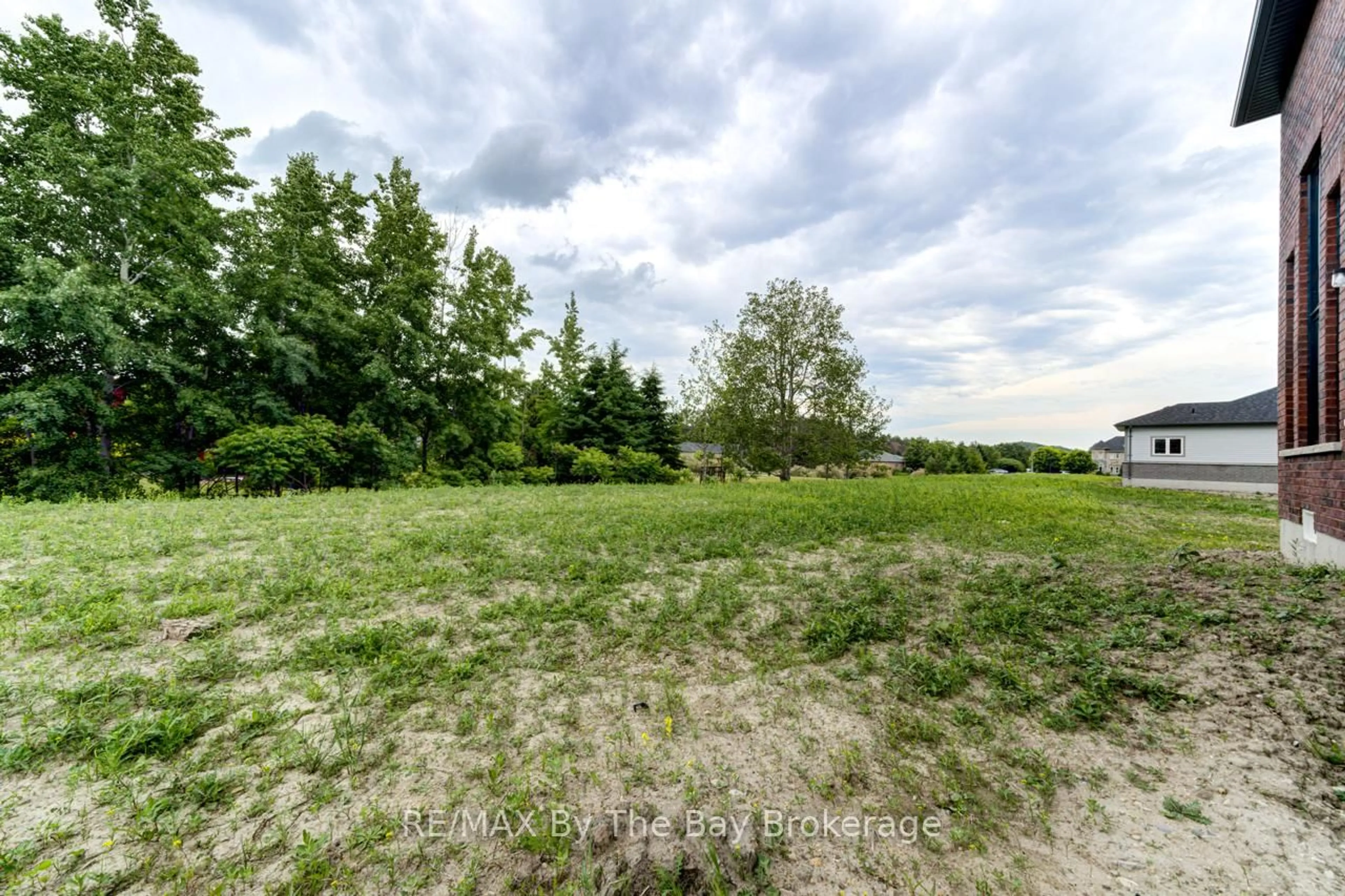 A pic from outside/outdoor area/front of a property/back of a property/a pic from drone, forest/trees view for 12 Misty Ridge Rd, Wasaga Beach Ontario L9Z 0R8