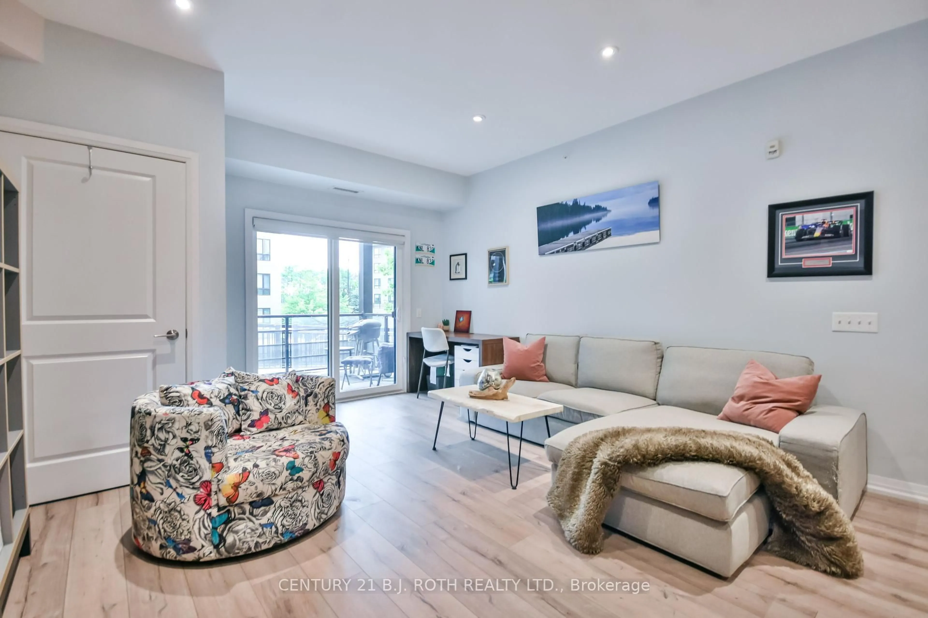 Living room with furniture, unknown for 306 Essa Rd #107, Barrie Ontario L9J 0H5