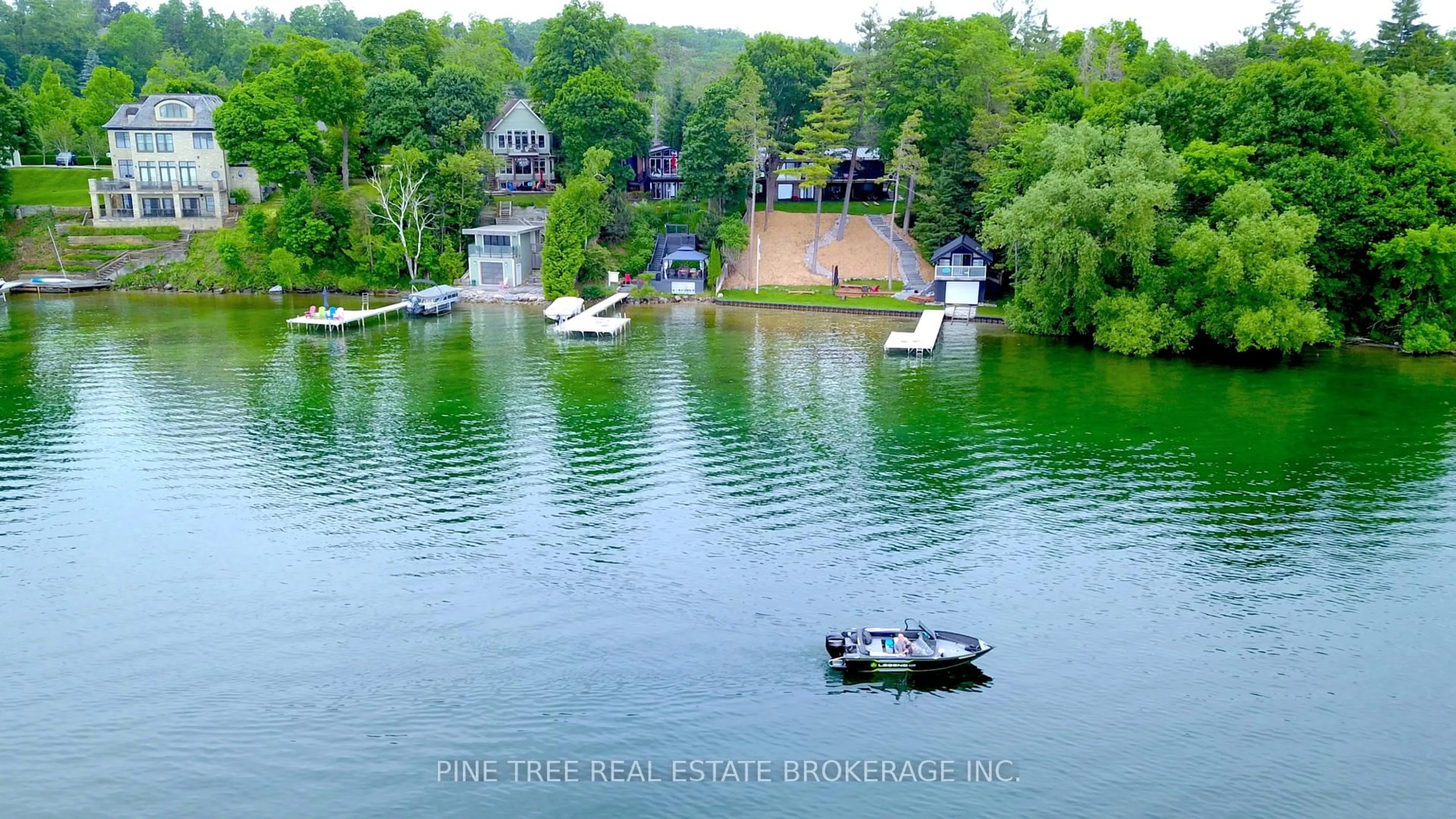 A pic from outside/outdoor area/front of a property/back of a property/a pic from drone, water/lake/river/ocean view for 65 Barrie Terr, Oro-Medonte Ontario L4M 1E8