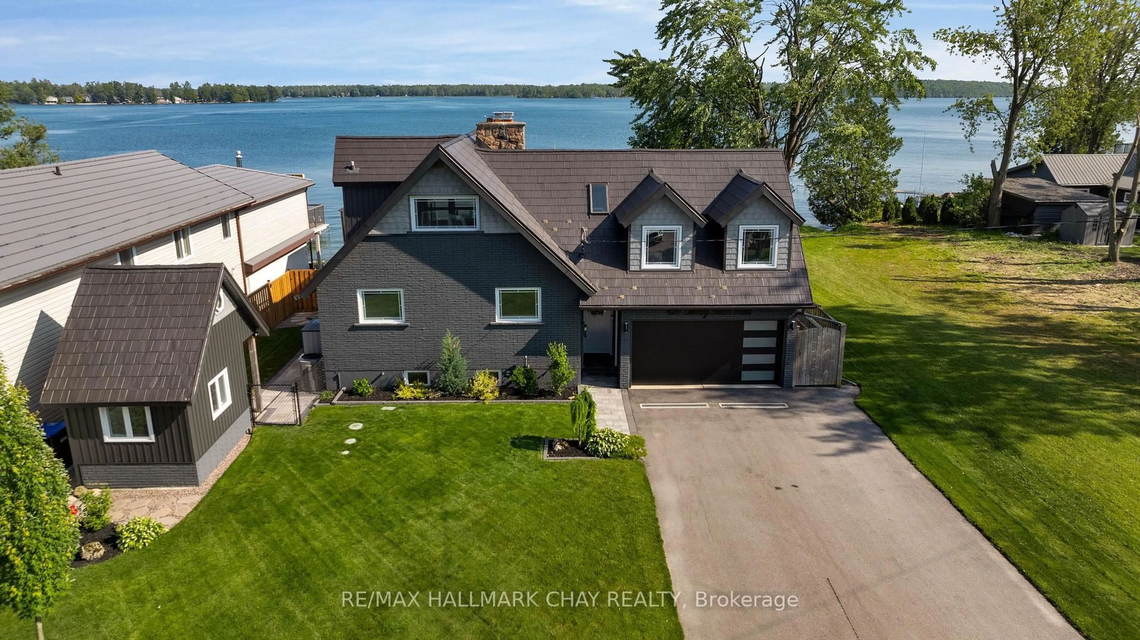 A pic from outside/outdoor area/front of a property/back of a property/a pic from drone, water/lake/river/ocean view for 4217 Orkney Beach Rd, Ramara Ontario L3V 0S1