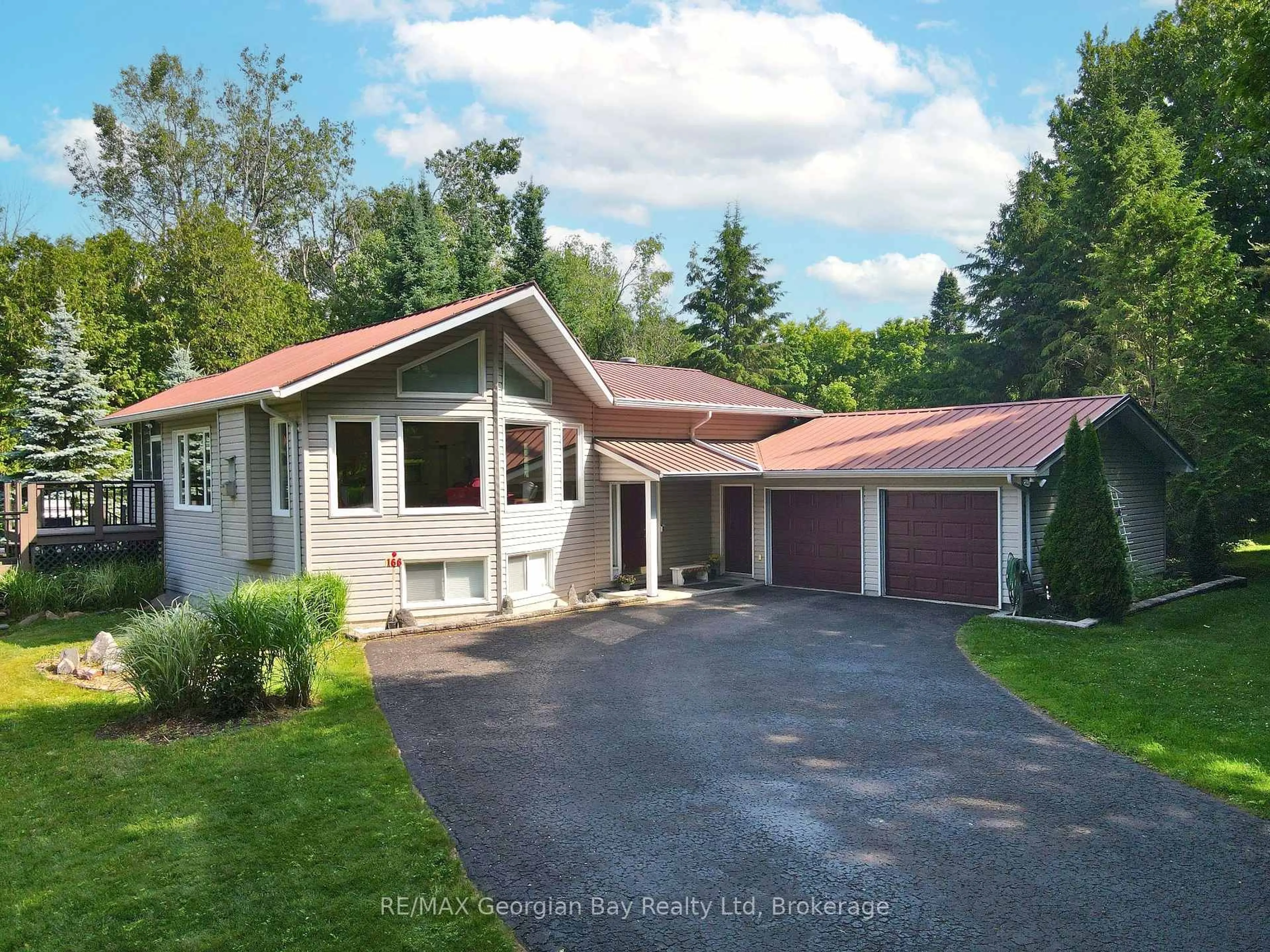A pic from outside/outdoor area/front of a property/back of a property/a pic from drone, street for 166 Albin Rd, Tay Ontario L0K 2C0