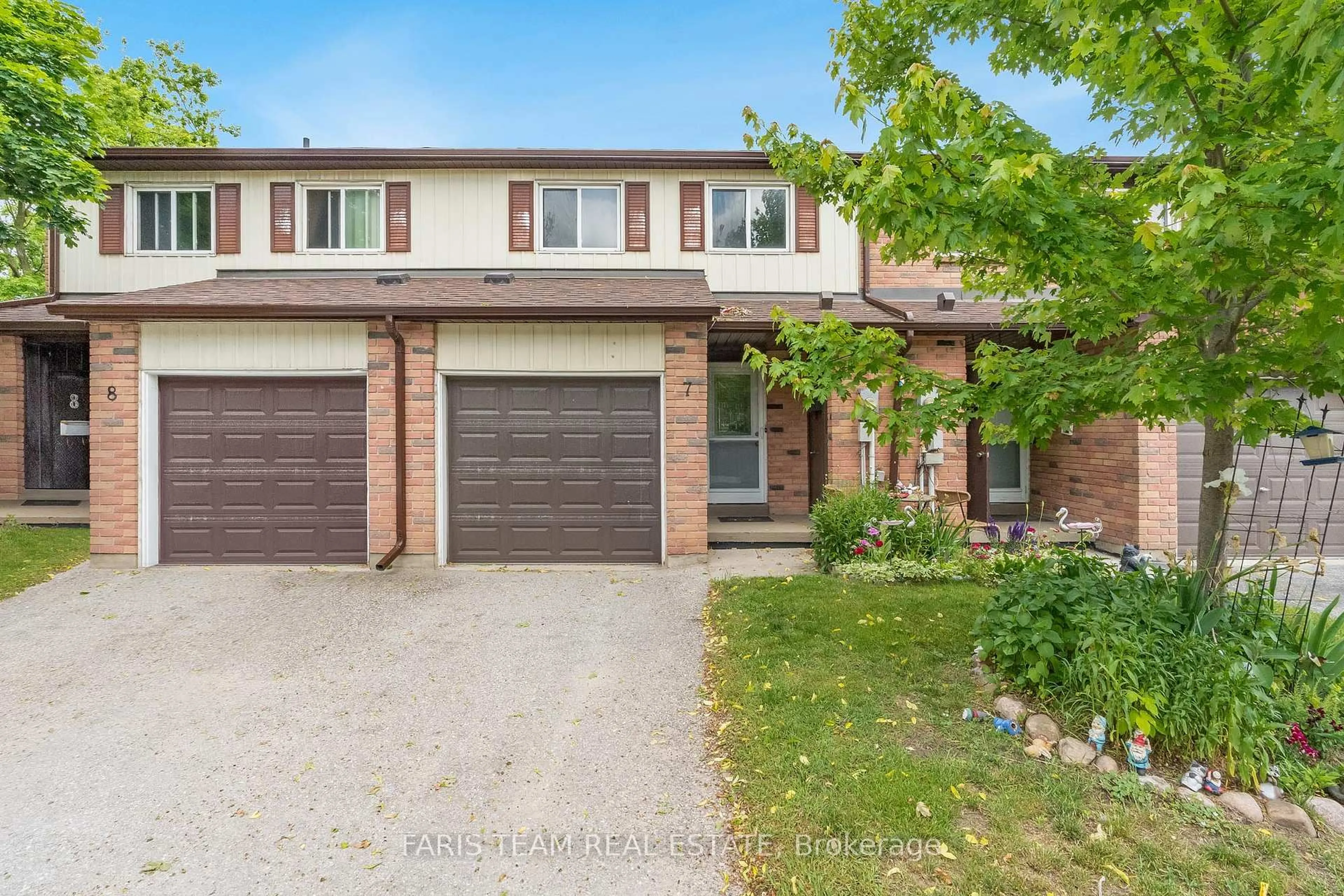 Home with brick exterior material, street for 52 Adelaide St #7, Barrie Ontario L4N 3T5