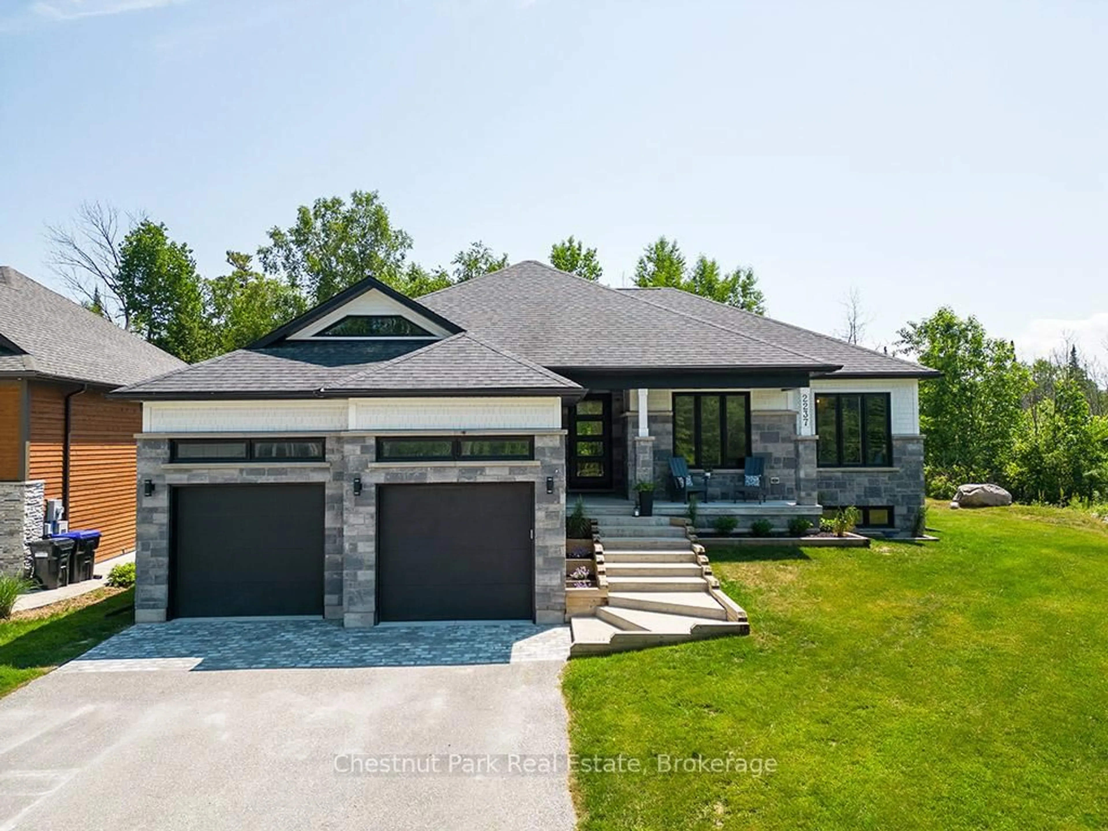 Home with brick exterior material, street for 2237 Shore Lane, Wasaga Beach Ontario L9Y 2X7