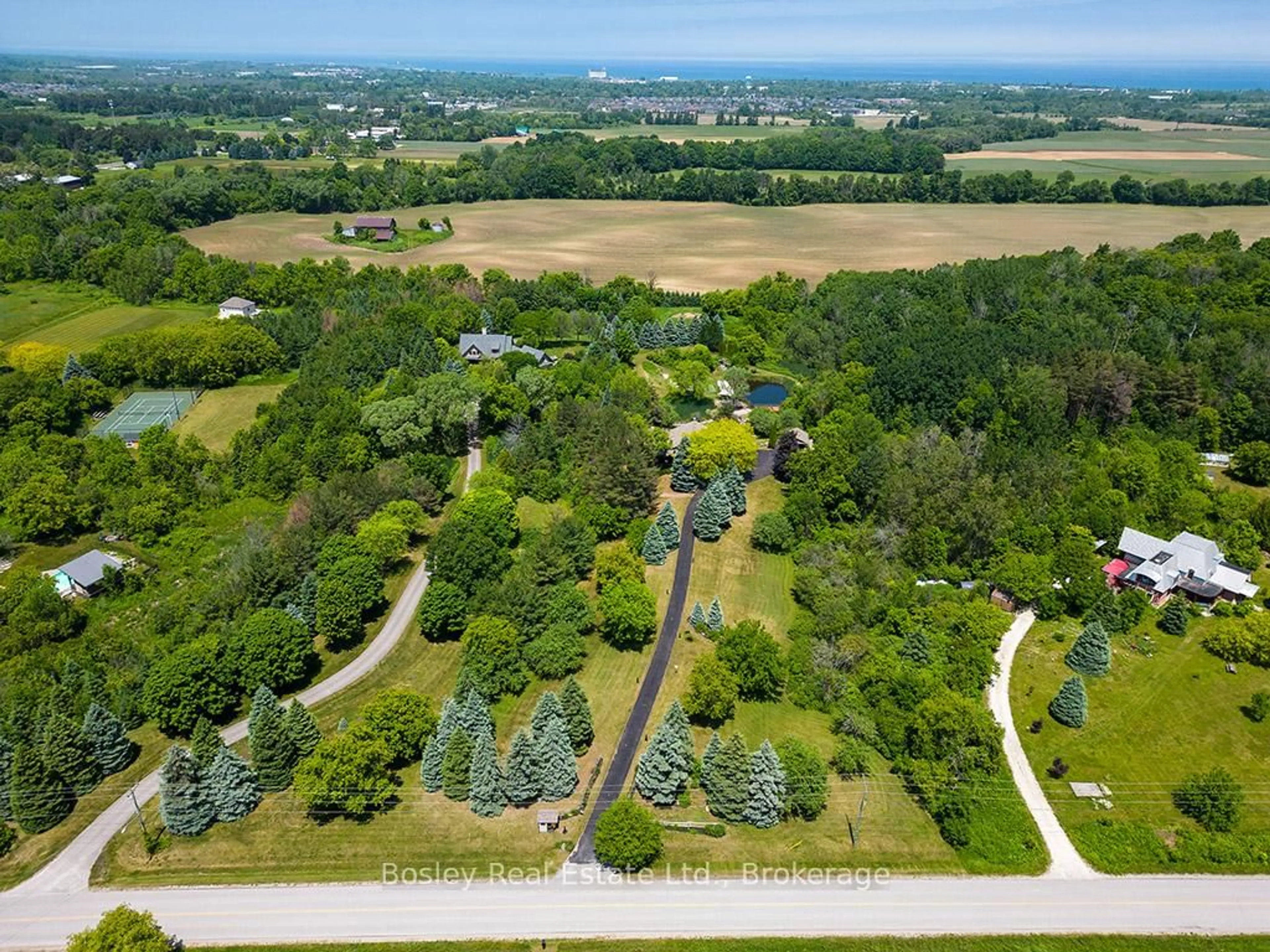 A pic from outside/outdoor area/front of a property/back of a property/a pic from drone, forest/trees view for 7496 Nottawasaga  36/37 Sdrd, Clearview Ontario L9Y 3Z1